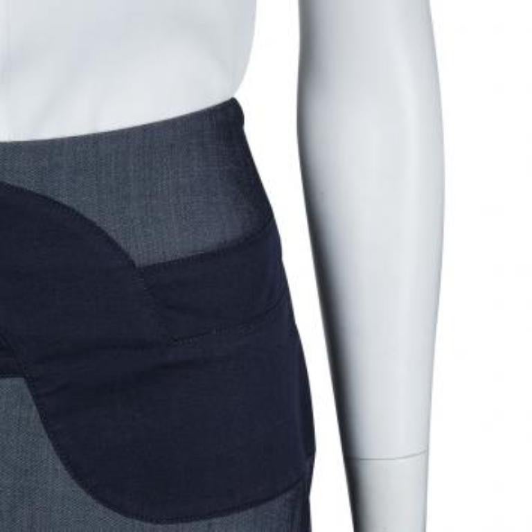 Featuring a feminine, ladylike silhouette Emporio Armani’s indigo skirt is secured with a concealed zip on the side. A contrast waist panel draws attention to your frame and structured in a body-flattering A-line shape.