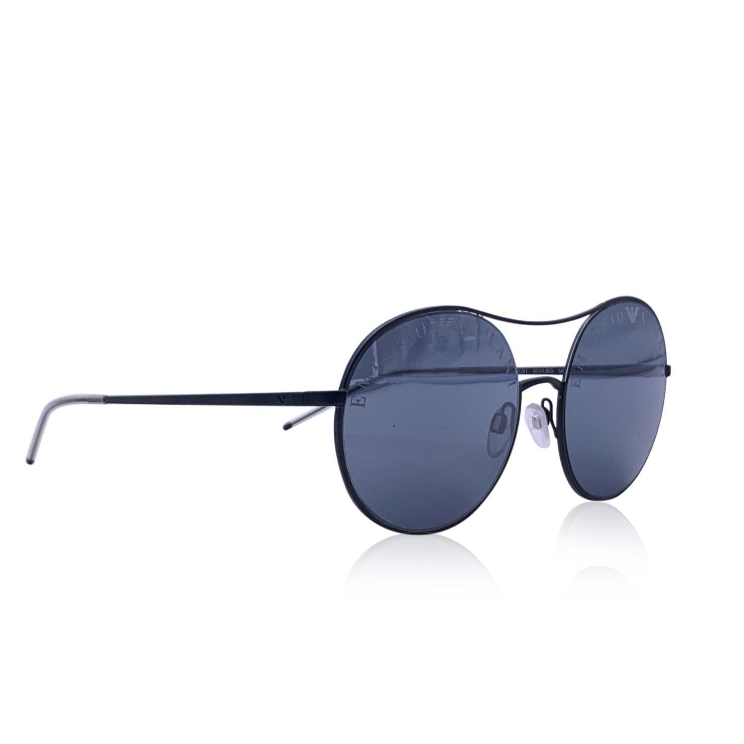 Emporio Armani Mint Women Sunglasses, Mod. EA2081 30016G56. Round shaped. Black metal frame with mirrored lenses. Made in Italy. Style and refs: 56/18-139 mm Details MATERIAL: Metal COLOR: Black MODEL: EA2081 30016G56 GENDER: Women COUNTRY OF