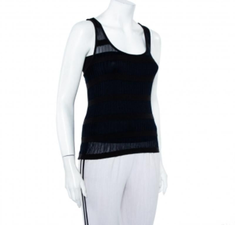 Easy to pair with skirts, shorts, or pants, this Emporio Armani tank top can be used to create multiple looks. It is knit using quality materials, and it features a scoop neckline and cross-strap detailing at the back.