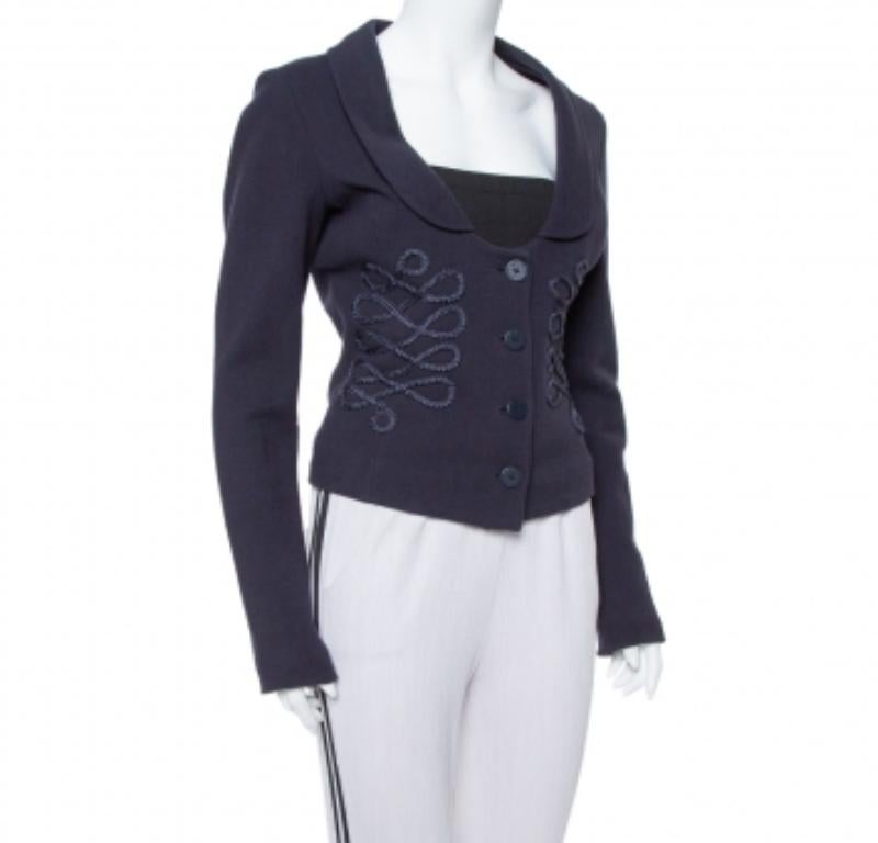 Keep it neat yet ornate with this adorable jacket from the house of Emporio Armani. It features knit trim details and button fastening on the front. Wear it with flared pants for a chic look.