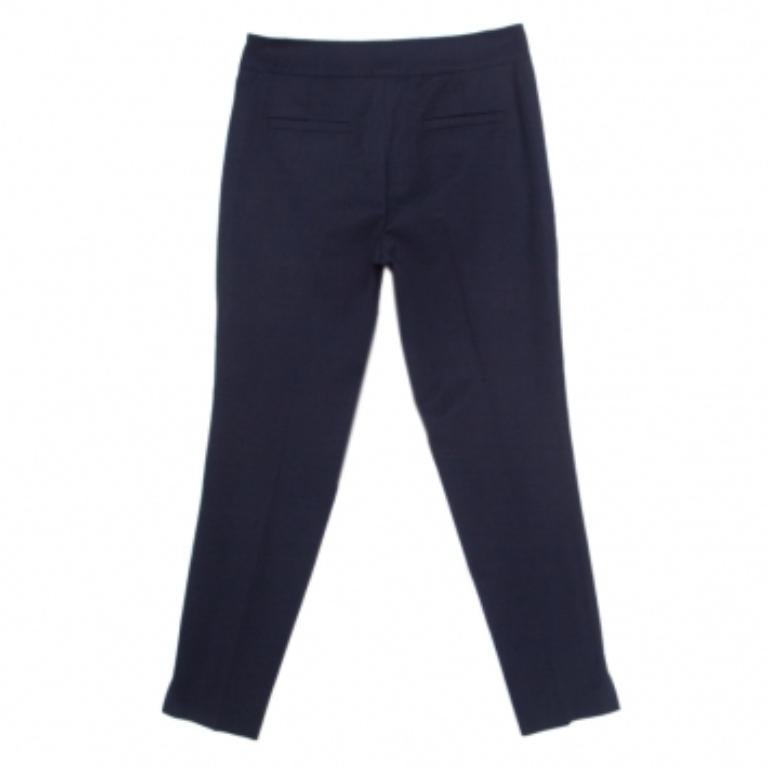 Questi pantaloni sartoriali blu navy di Emporio Armani ti faranno apparire elegante e alla moda senza compromettere il comfort. I pantaloni sono realizzati in misto lana e ti garantiranno un'ottima vestibilità. Abbinali a un blazer e a dei mocassini