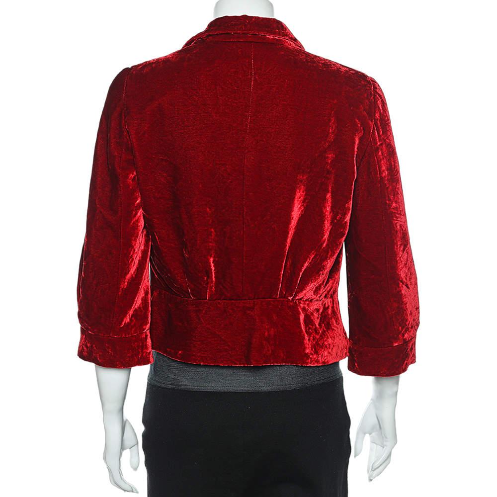 With a hue so attractive and a silhouette so neatly tailored, you are bound to fall in love with this blazer from the House of Emporio Armani. It has been stitched using red velvet fabric, which lends its appearance a very lavish and enchanting