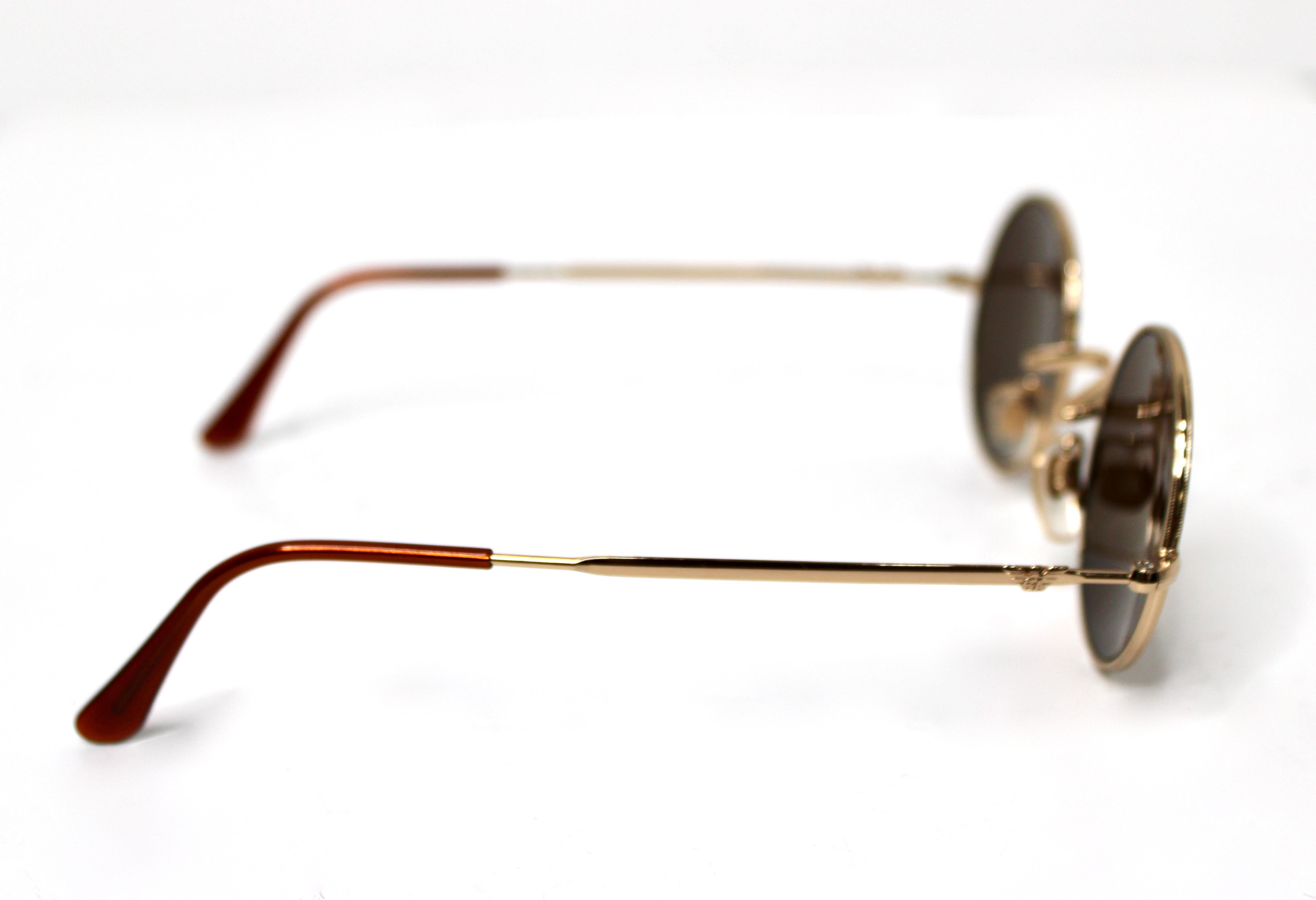 Emporio ARMANI Lunettes de soleil rondes à verres miroirs et monture en métal doré circa 1990 en vente 4