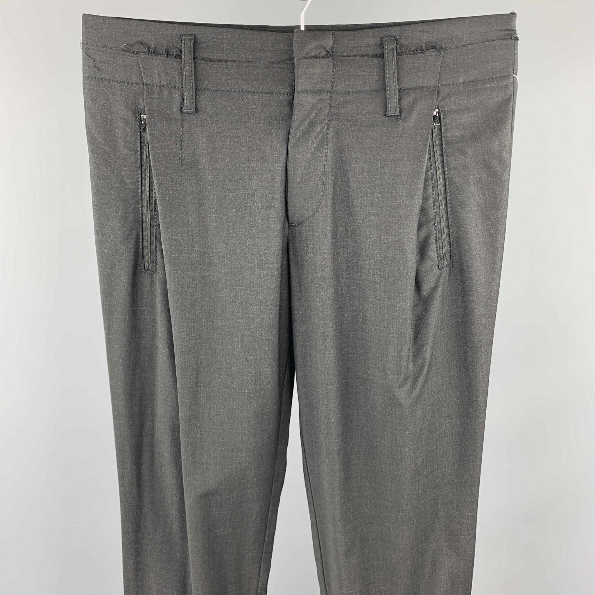 EMPORIO ARMANI Casual Pants comes in a black wool blend featuring a flat front style, distressed details, contrast stitching, zipper pockets, and a zip fly closure. Made in Italy.
Excellent
Pre-Owned Condition. 

Marked:   30 

Measurements: 
 