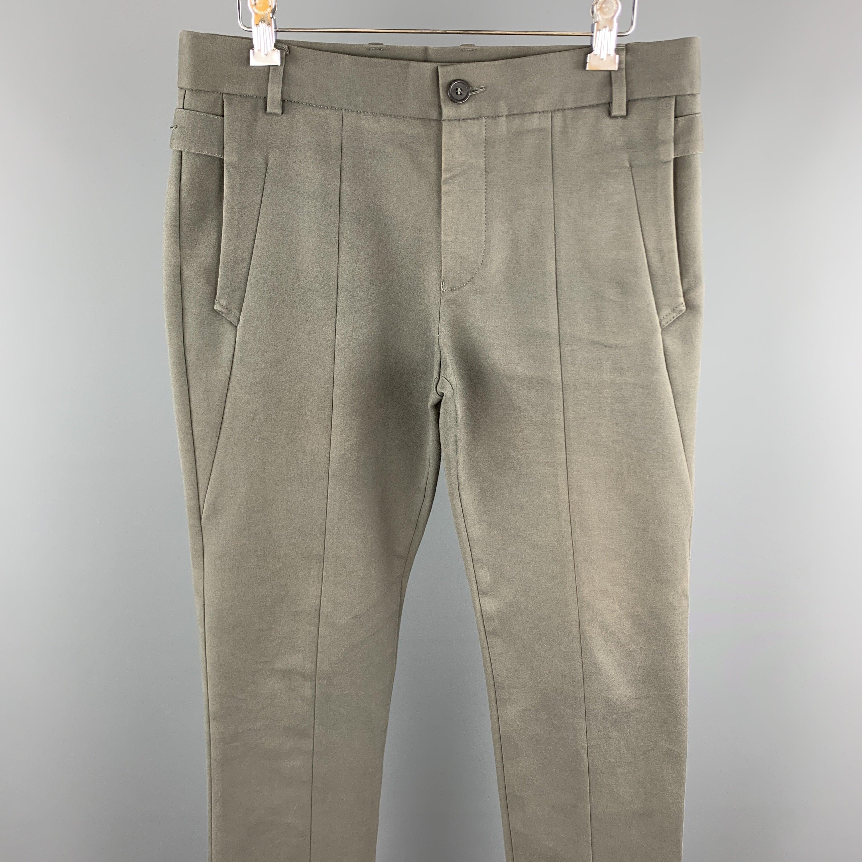 EMPORIO ARMANI casual pants comes in a slate cotton / elastane featuring stitching details, buttoned pocket attachment, and a zip fly closure. As Is. Made in Italy.
Very Good
Pre-Owned Condition. 

Marked:   IT 46 

Measurements: 
  Waist: 33 inches