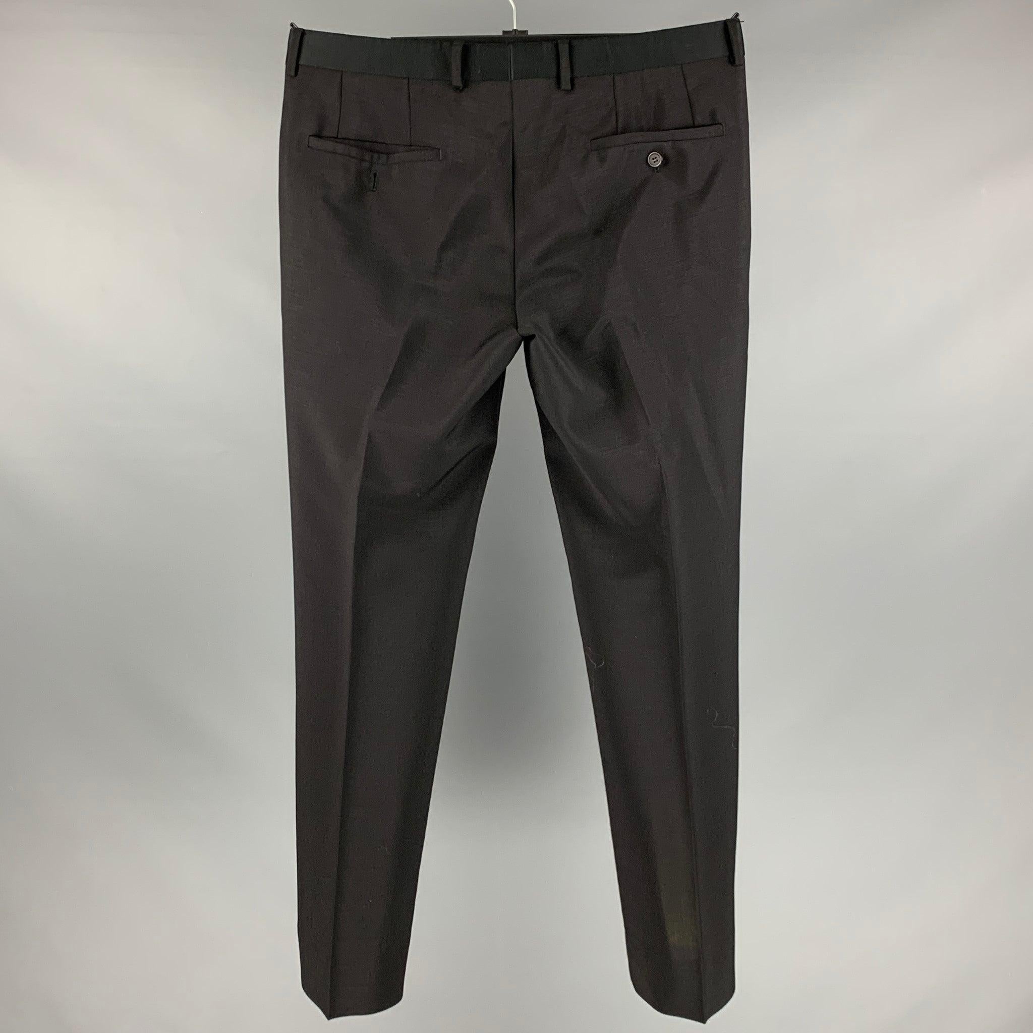 EMPORIO ARMANI tuxedo dress pants in a black mohair wool blend featuring a regular fit, and zipper fly closure. Made in Italy.Very Good Pre-Owned Condition. Minor signs of wear. Missing one button. 

Marked:  50 

Measurements: 
 Waist: 32 inches