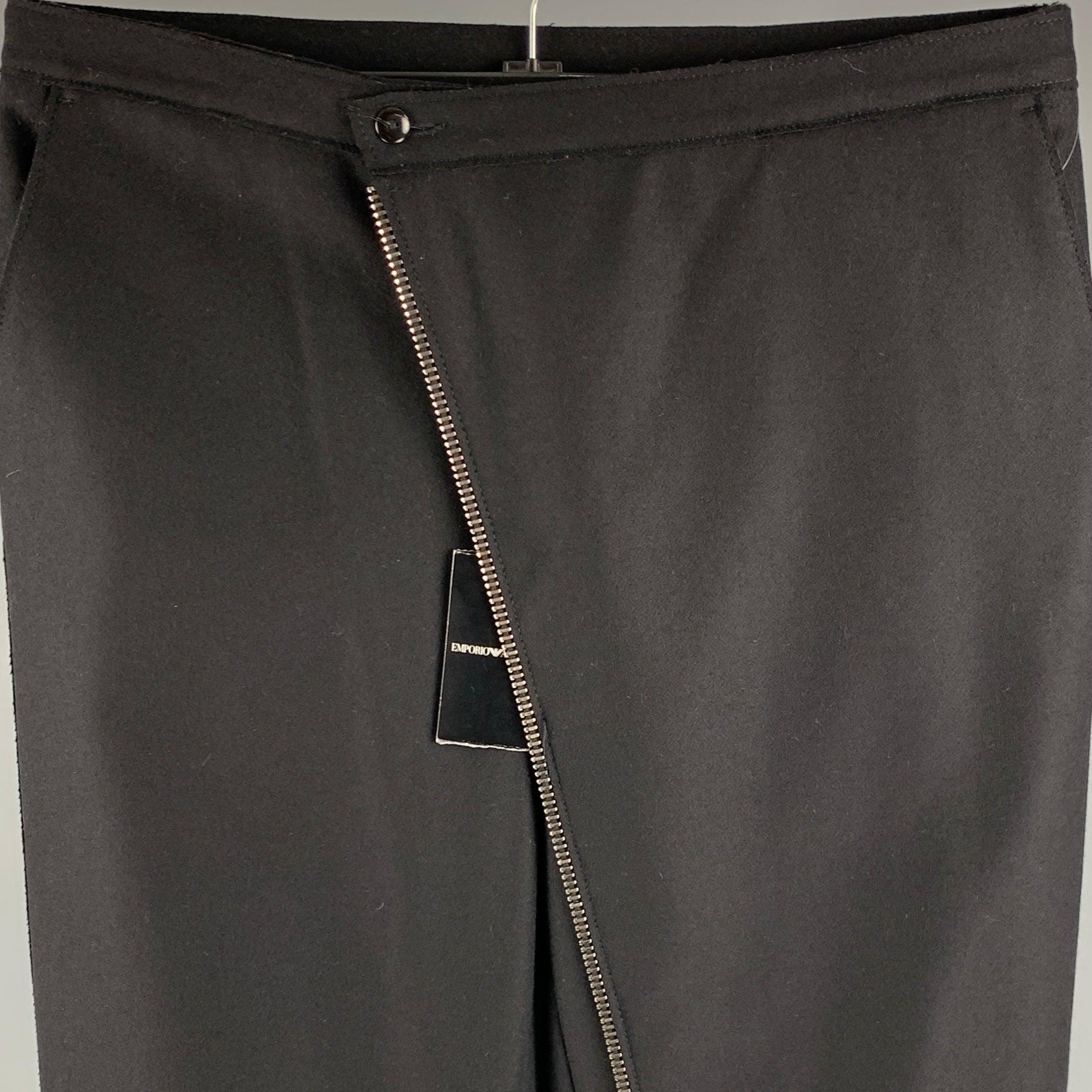 EMPORIO ARMANI dress pants in a black wool blend fabric featuring asymmetrical zipper detail, and zip fly closure. Made in Italy.New with Tags. 

Marked:   IT 50 

Measurements: 
  Waist: 34 inches Rise: 9.5 inches Inseam: 30 inches 
  
  
