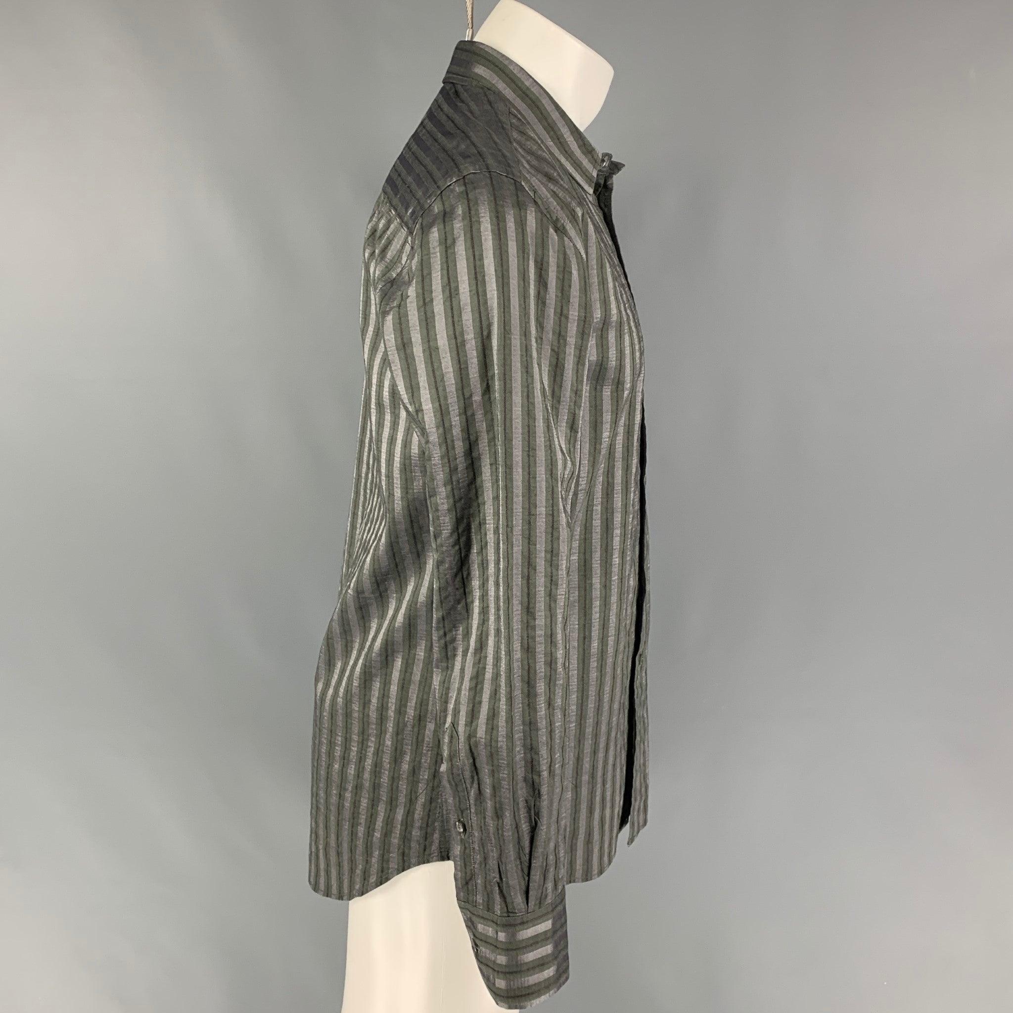 EMPORIO ARMANI long sleeve shirt comes in grey & olive stripe cotton / viscose featuring a spread collar and a button up closure.Very Good
Pre-Owned Condition.  

Marked:   L  

Measurements: 
 
Shoulder: 18.5 inches  Chest: 42 inches  Sleeve: 26