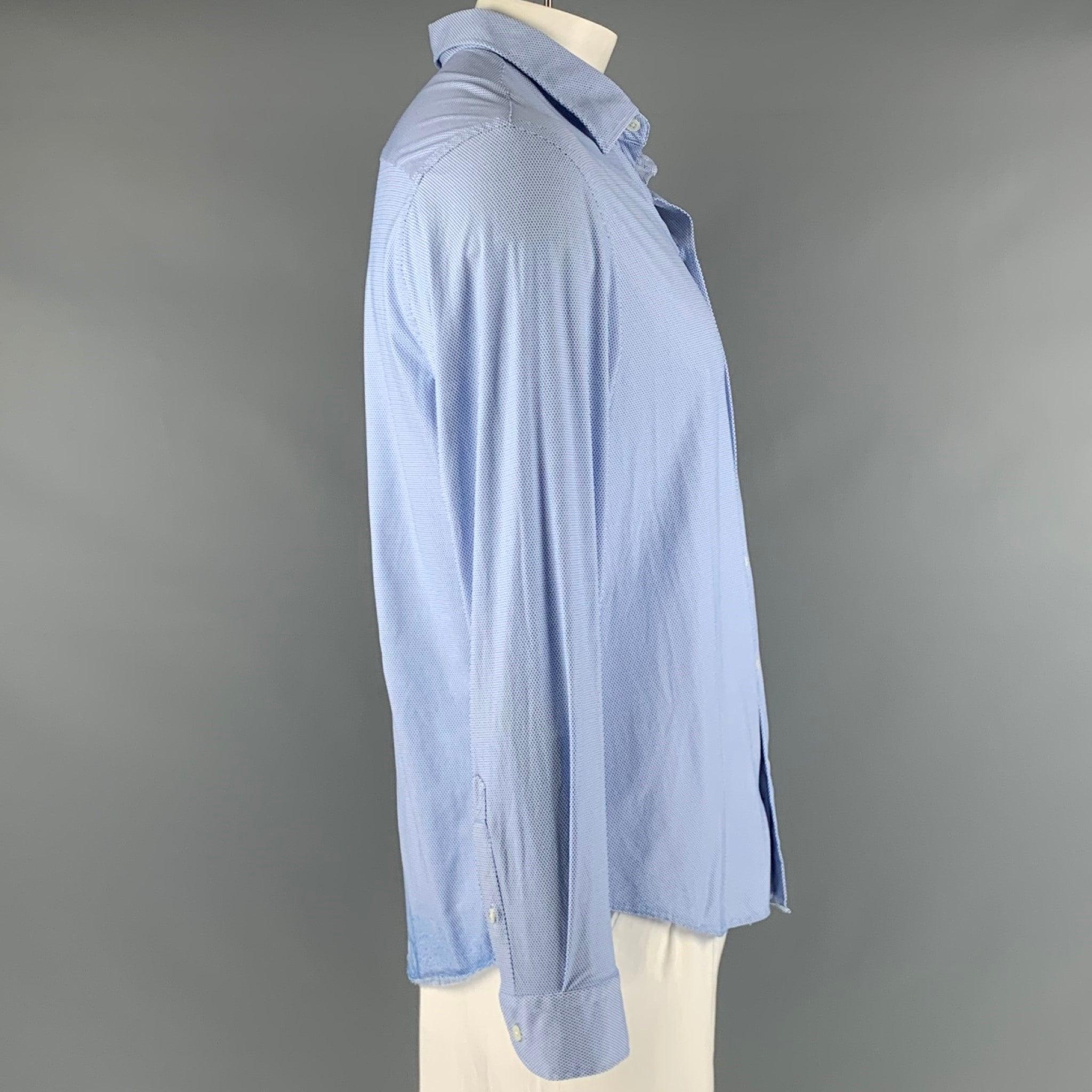 EMPORIO ARMANI long sleeve shirt
short in a stretchy white polyamide blend fabric featuring a blue nailhead pattern, spread collar, and button closure.Very Good Pre-Owned Condition. Moderate pilling at hem. 

Marked:   XXL 

Measurements: 
