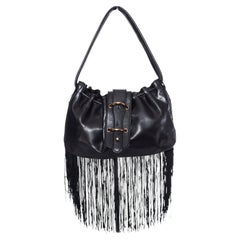 Emporio Armani, Vintage black leather handbag with fringes.