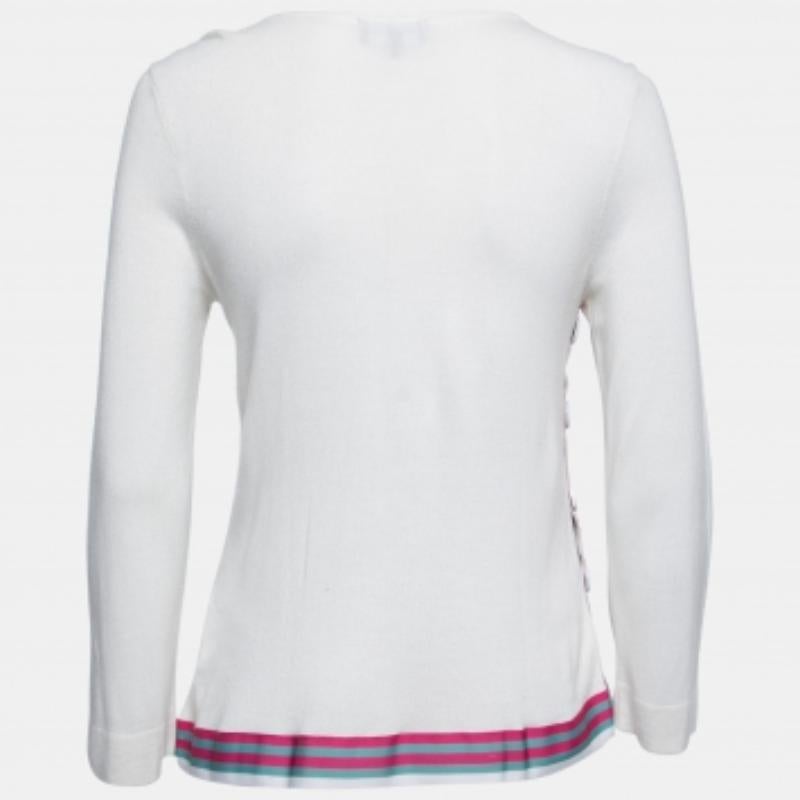 This gorgeous top by Emporio Armani will surely elevate your wardrobe. Crafted from quality materials, it comes in a white hue. The top features long sleeves and a flattering silhouette. Pair it with jeans and booties to create a chic look.