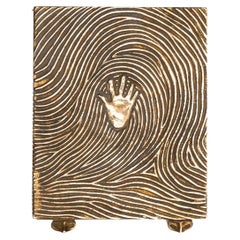 Empreinte (Fußabdruck), Puderdose aus vergoldeter Bronze von Line Vautrin, Frankreich