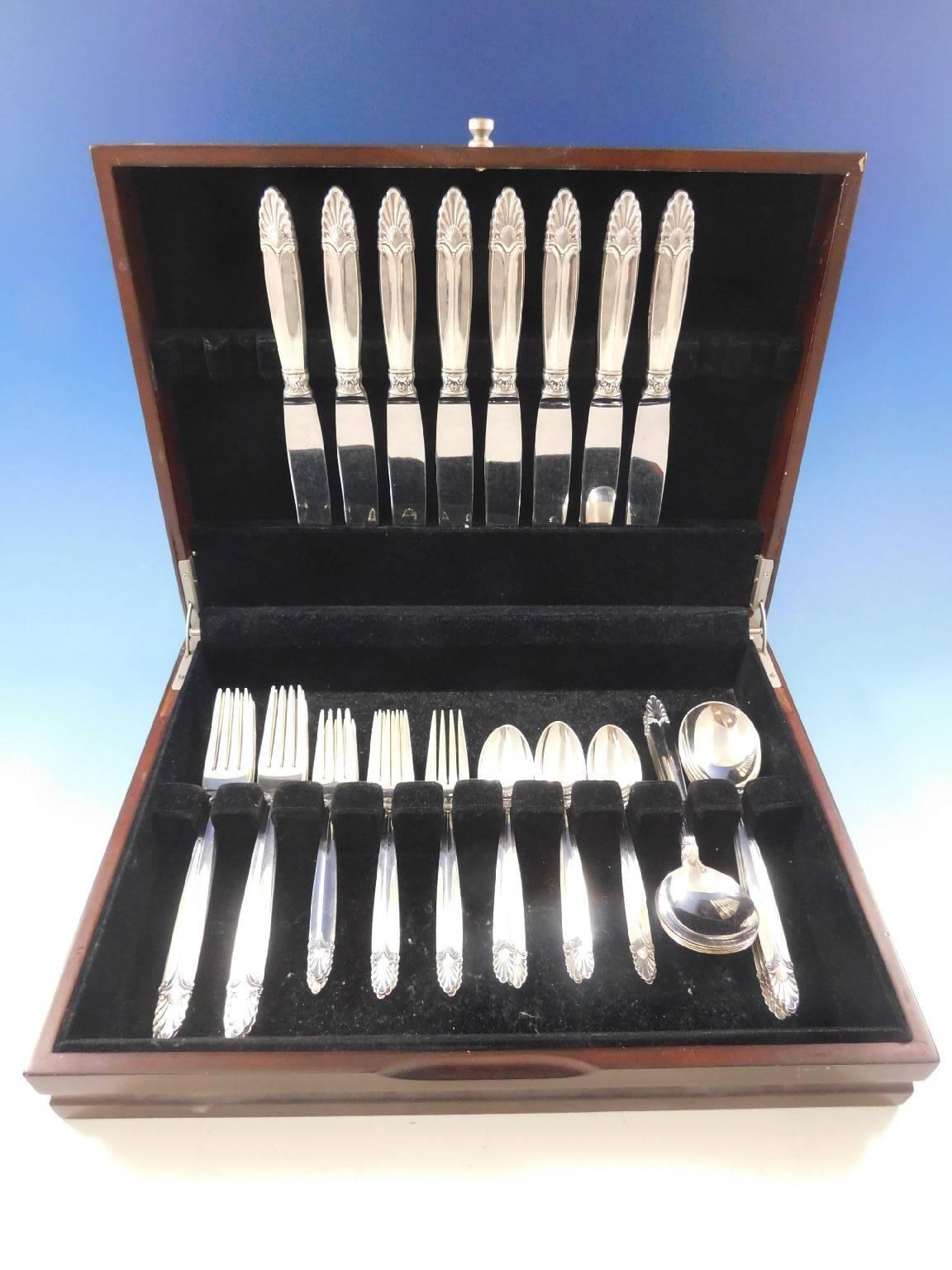 Dinner size Empress by international sterling silver flatware set of 40 pieces. This set includes:

Eight dinner size knives, 9 1/2