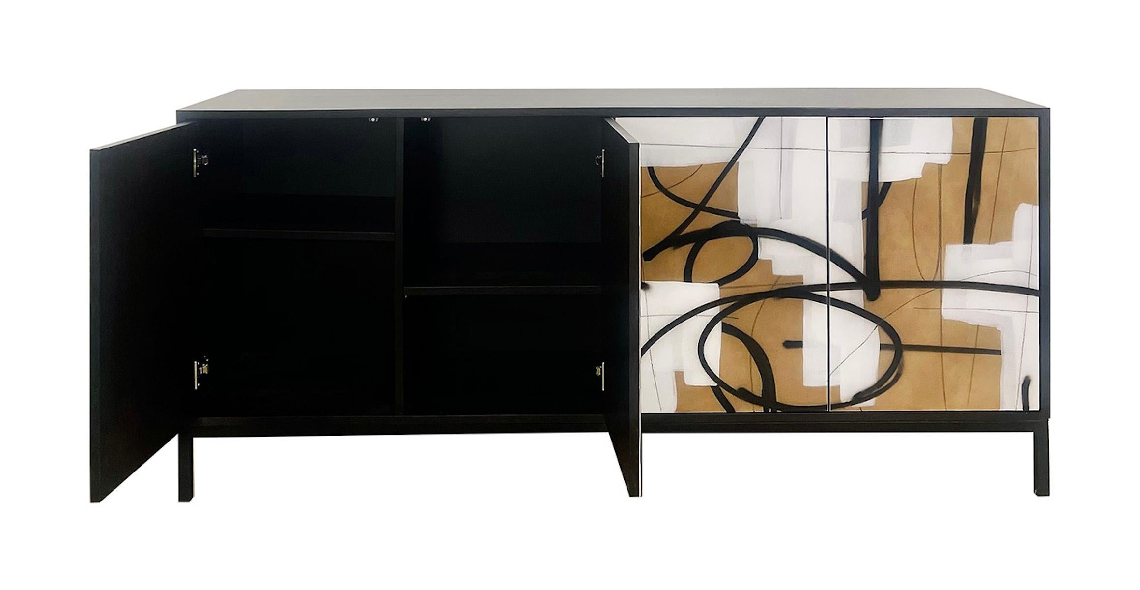 The Enamel Abstract Armoire is a one-of-a-kind piece designed and hand-finished in Morgan Clayhall's Toronto studio. With over two decades of design expertise, the studio crafts bespoke furniture that seamlessly combines functionality and
