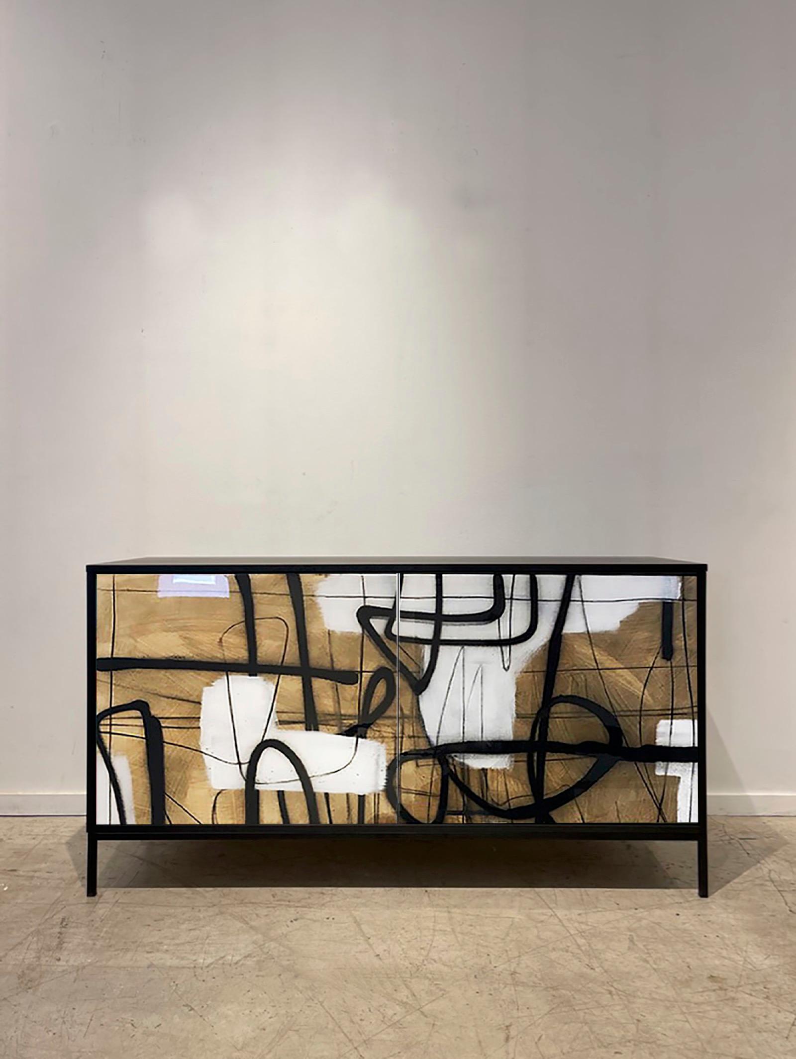 The Enamel Abstract cabinet  is designed and finished in our Toronto studio, Morgan Clayhall. 

Drawing from the over twenty years of design backgrounds, the studio creates exquisitely crafted custom furniture.  The artwork is created by artist,