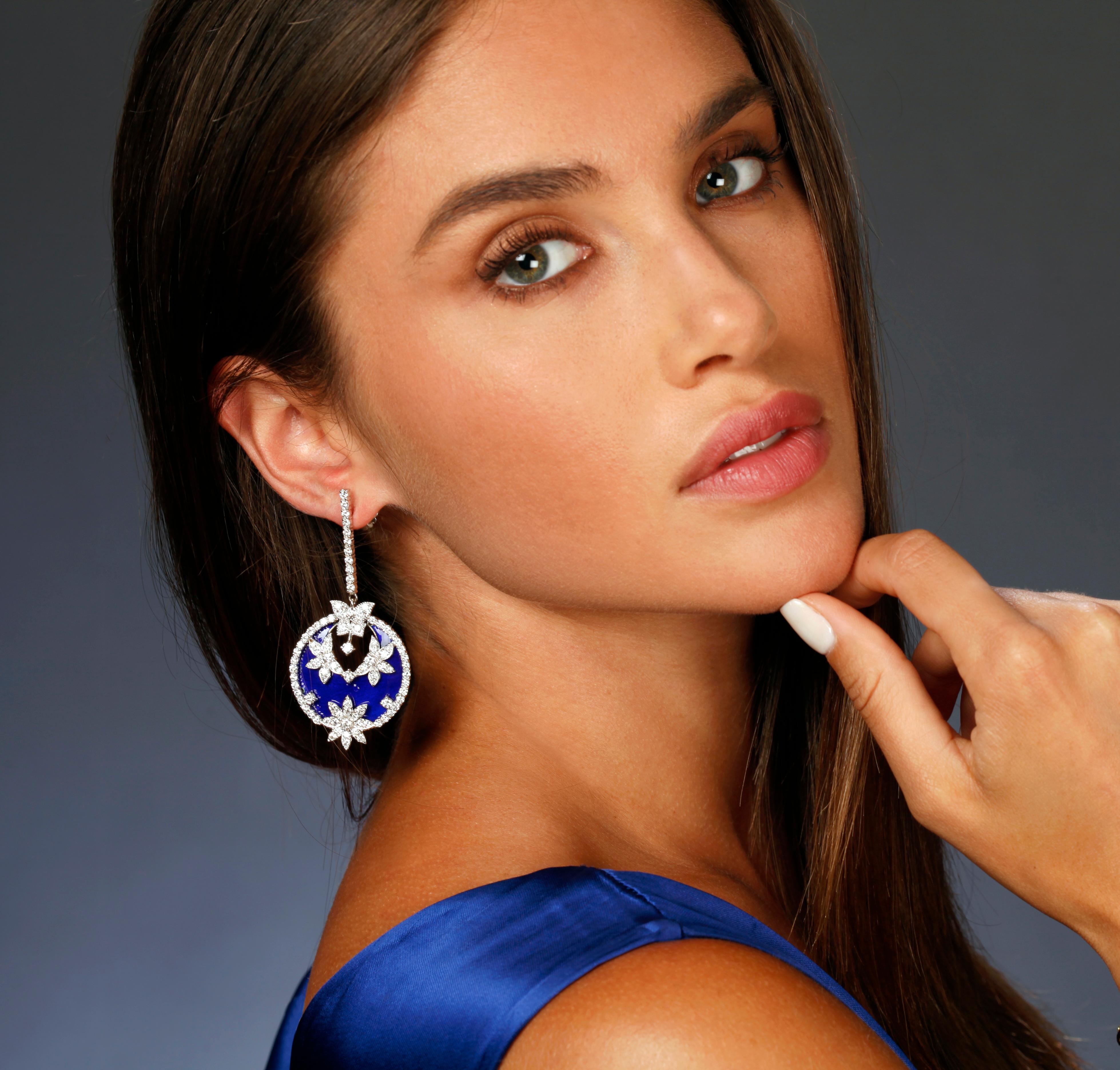 18K White Gold Cobalt Blue Enamel Floral and Butterfly Diamond Earrings by Stambolian

These state-of-the-art earrings by Stambolian are truly remarkable in design and quality. The drops signify a unique take on the ordinary by combining everyday