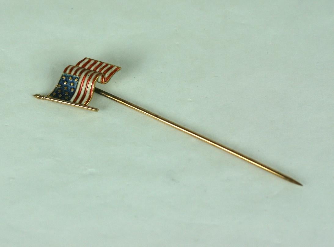 Rare Enamel and 14k Gold American Flag Stickpin from the 1930's. Beautifully colored  and detailed enamel work with 13 stars on flag. 

Marked 