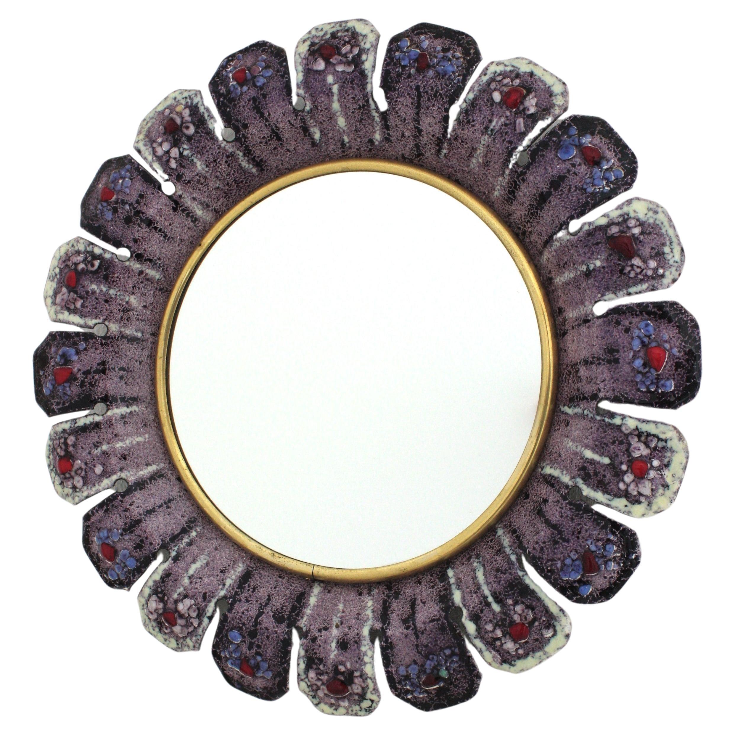 Midcentury sunburst flower mirror in multi-color enamel and brass, France, 1950s
Inspired in Francois Lembo mirrors.
Materials: Enameled metal and brass
Colors: purple, pink, violet, lavender, white, red
Small sunburst mirror with enameled frame in