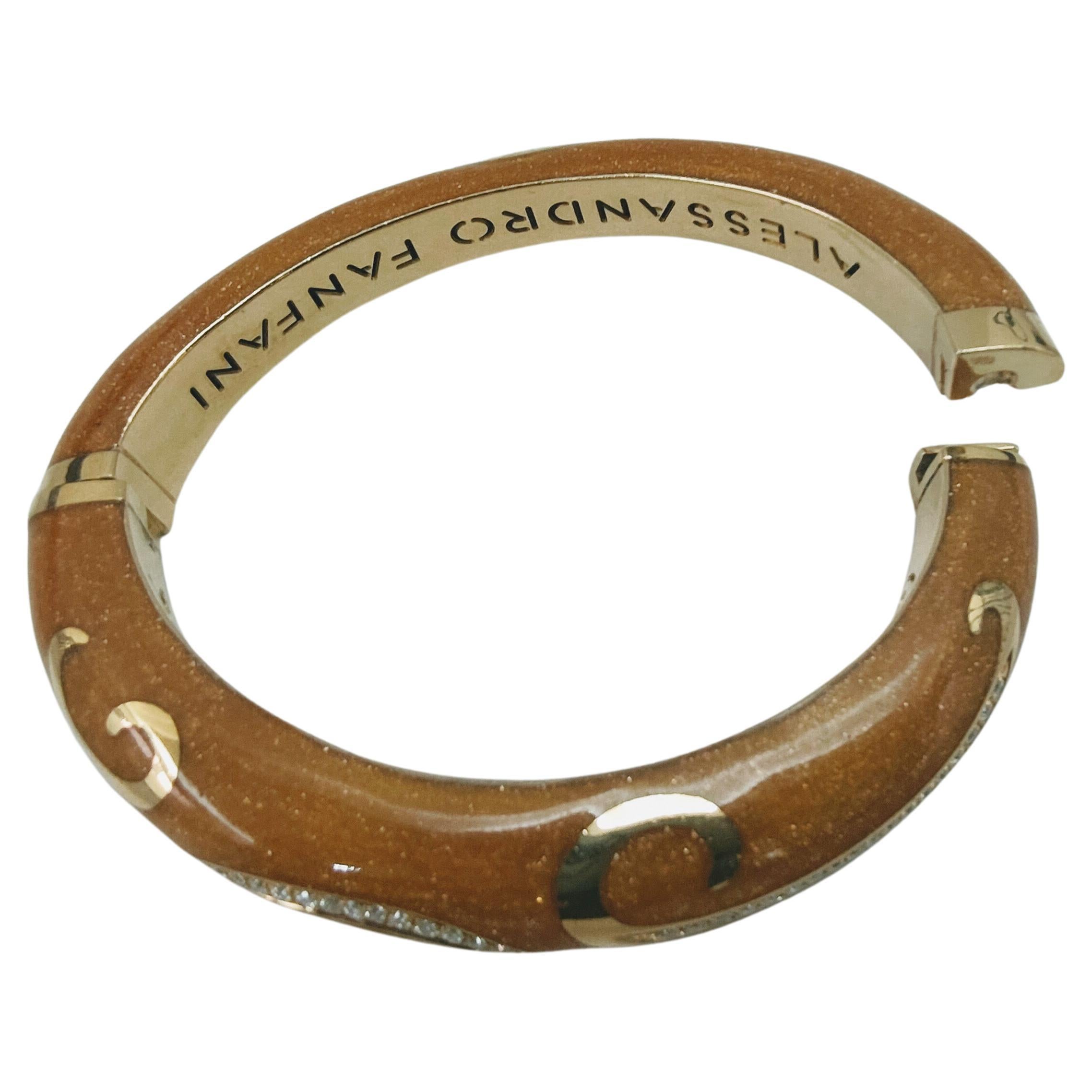 Excellent Enamel bracelet by Alessandro Fanfani made of yellow gold 18 Carats with a weight of 59.4 grams. It features curvilinear motifs set in brilliant-cut diamonds with a total of 0.80 carats. Inside it has openwork motifs. 
Inside Diameter