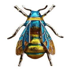 Spilla a forma di bombo d'epoca in smalto blu e giallo dorato