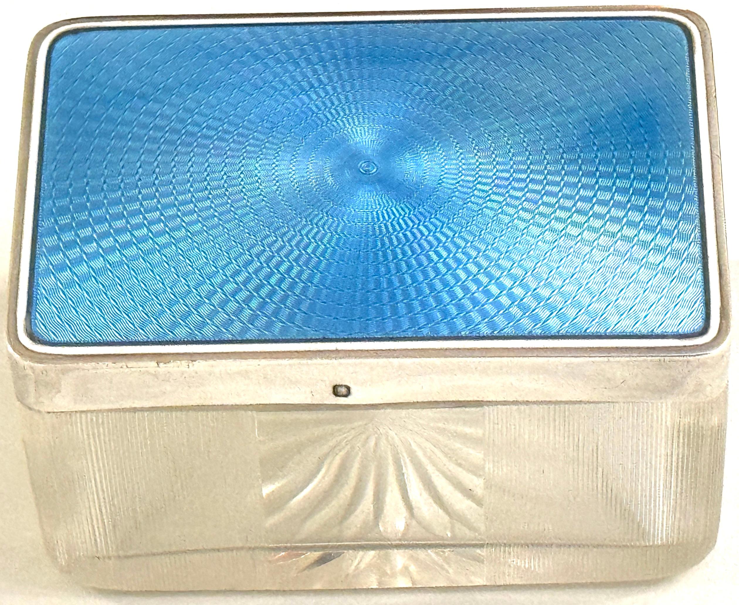 Rectangular French Silver Light Blue Guilloché Enamel and Crystal Table Box 
Hallmarked with French Minerva on the silver rim 

This exquisite rectangular French silver table box, standing 2 inches high, 3.75 inches wide, and 2 inches deep, is a