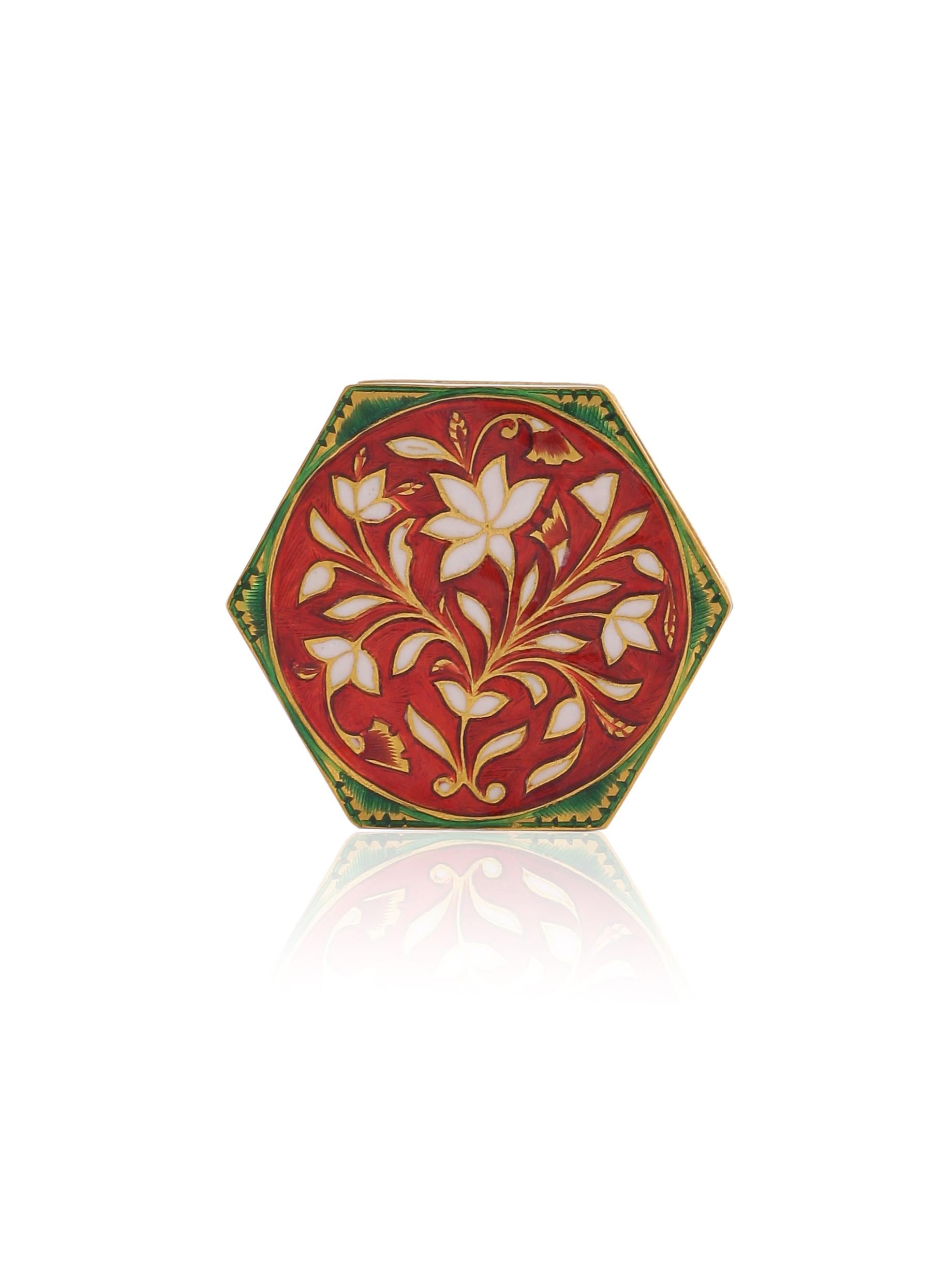 A beautiful box with fine enamel work studded with Diamonds. Similar enamel work can be seen in Indian and Mughal jewellery from centuries ago. The work and art of enamelling is Called 