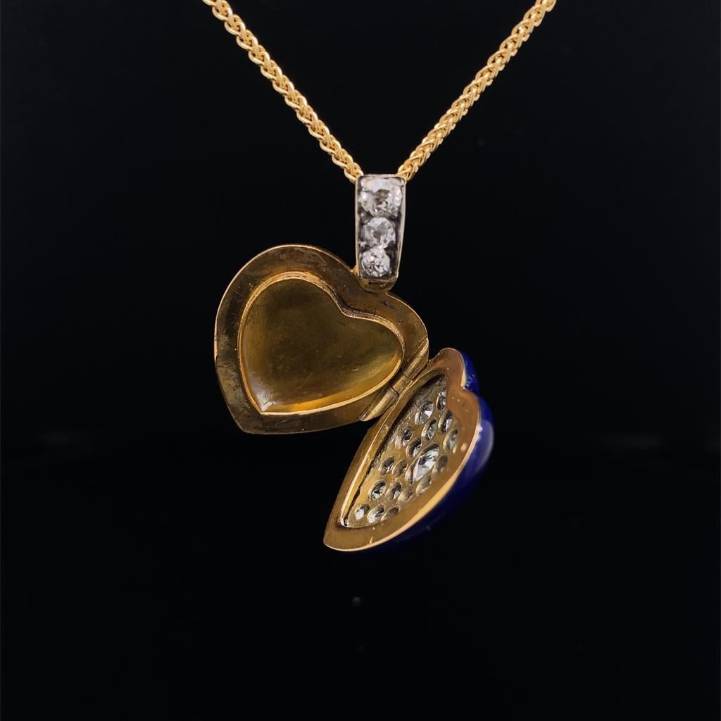 An enamel and diamond 18 karat yellow gold locket, circa 1900

Comprising of an original 18ct yellow gold heart shape locket of pave set old cut diamonds with a lively blue enamel outer surround and diamond set bale. 
Opening to reveal ample room