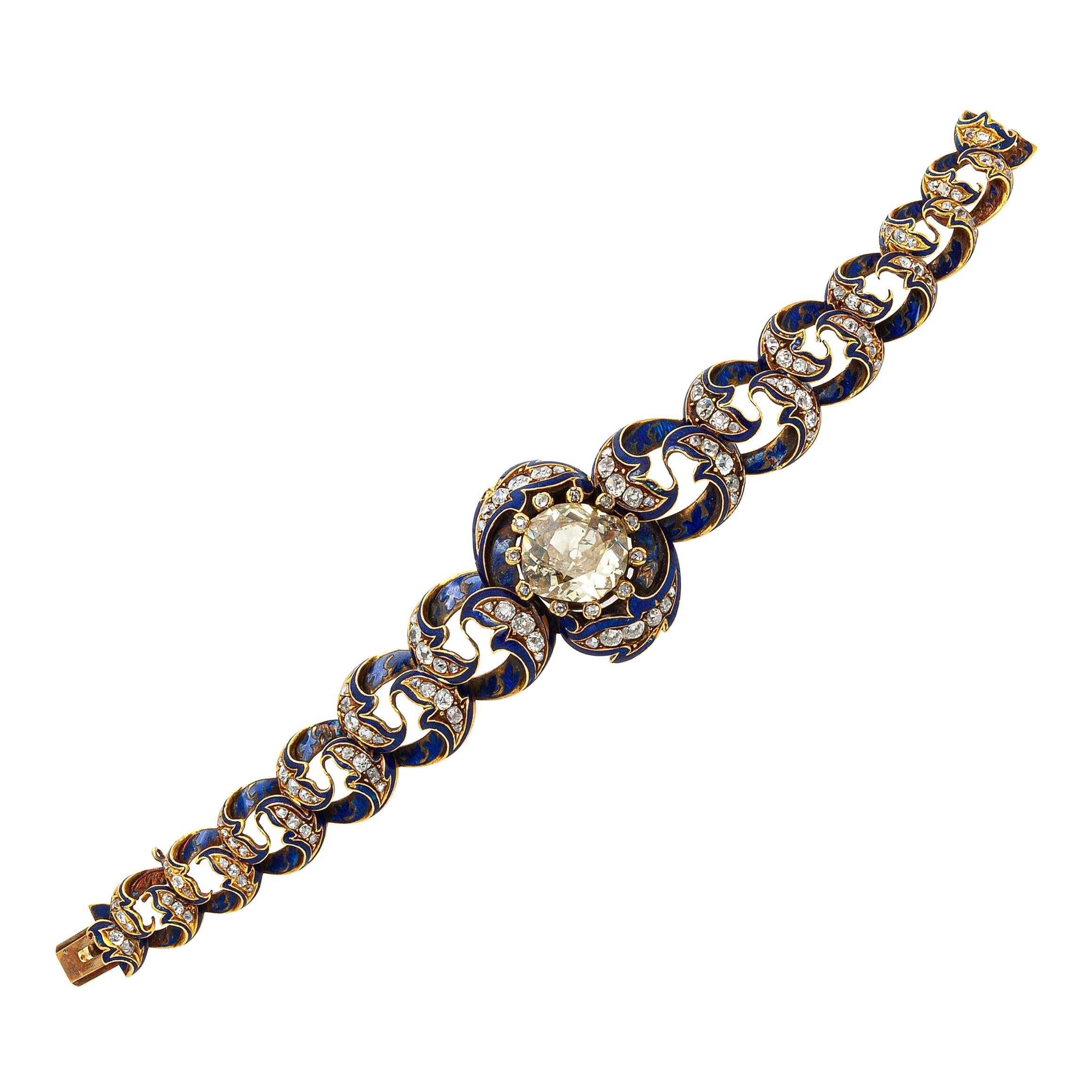 Finely crafted in 18k yellowing blue enamel with an old cut center cape diamond weighing approximately 9.50 carats. The bracelet features 130 small diamonds weighing approximately a total of 13.00 carats.
Victorian, circa 1900s