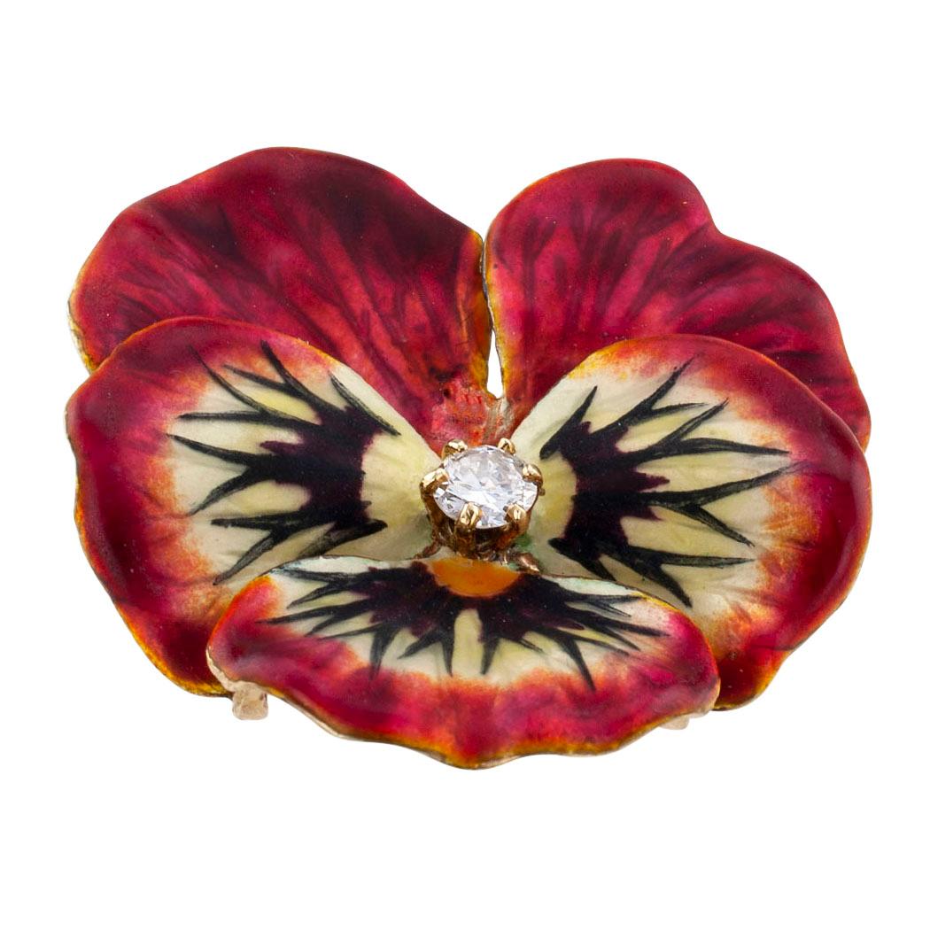 Vintage diamond enamel and gold pansy flower brooch pendant circa 1950. Designed as a single pansy flower centering upon a round diamond weighing approximately 0.20 carat, approximately J color and VS clarity, the petals decorated by realistic,