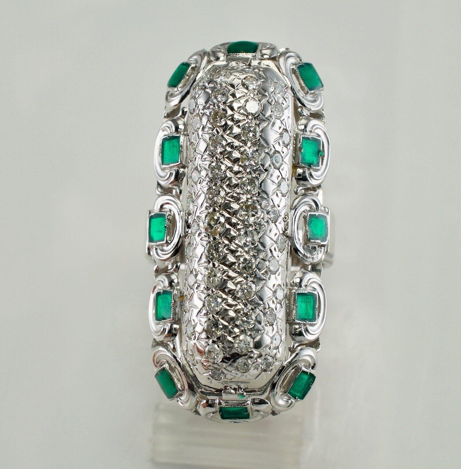 This one of a kind vintage ring is finely crafted in solid 14K White Gold and set with genuine diamonds and green enamel. The emerald green enamel is in perfect condition. The enamel pieces look like real emeralds, absolutely stunning color!

There