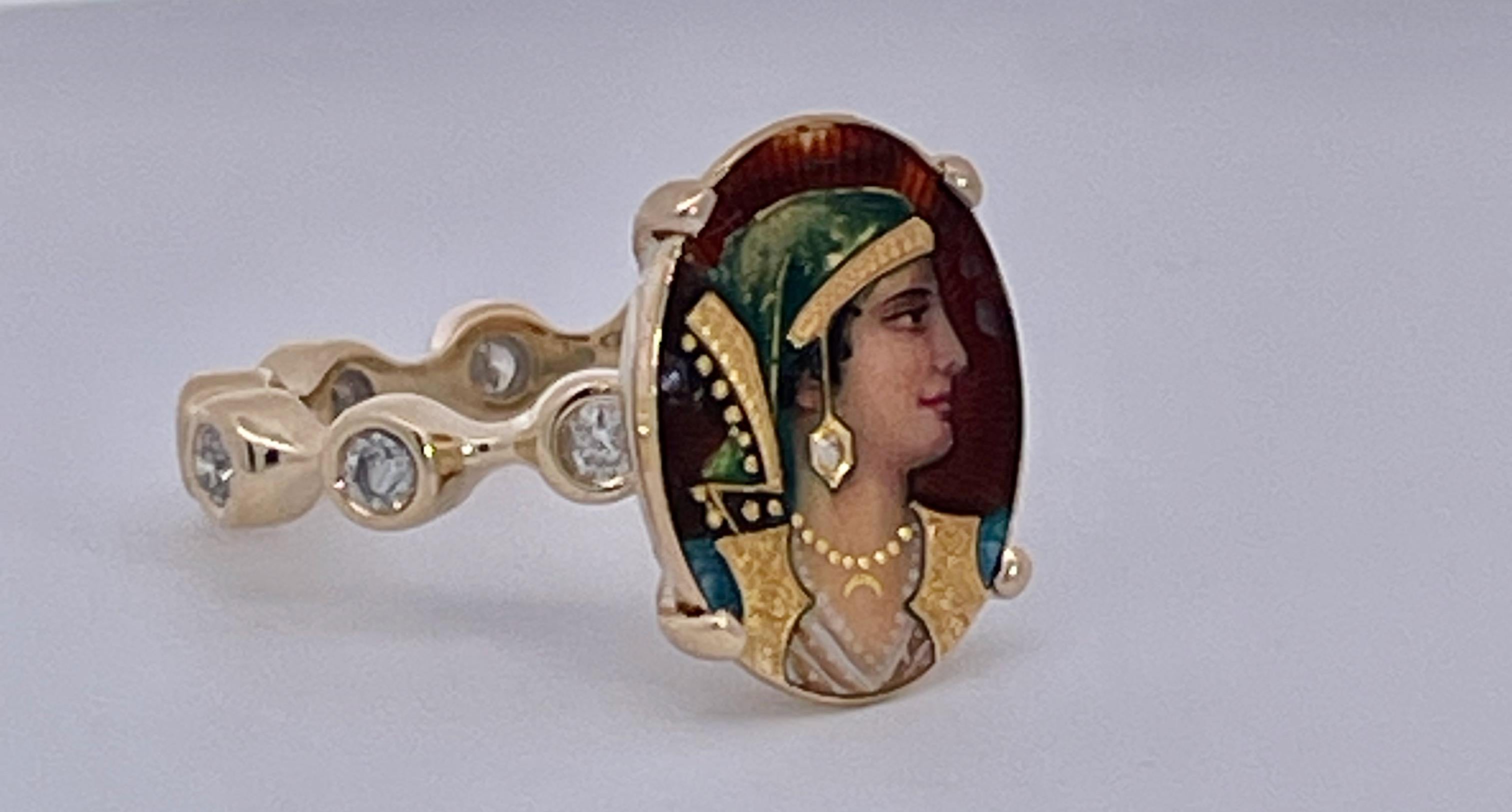 This ring has a beautiful face of Athena a Roman goddess.  This started life as a Stick pin but I couldn't help myself I had to turn this into a ring.  The face is beautiful with a tiny Diamond on her ear.  The band is set with ten 0.10 point