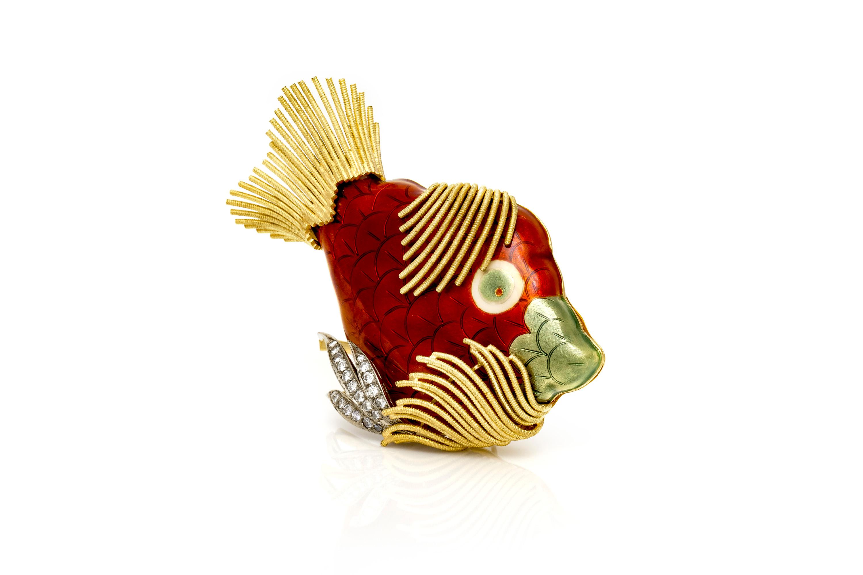 Enamel fish brooch finely crafted in 18 k yellow gold and platinum with red enamel and featuring weighing approximately a total of 1.00 carat.