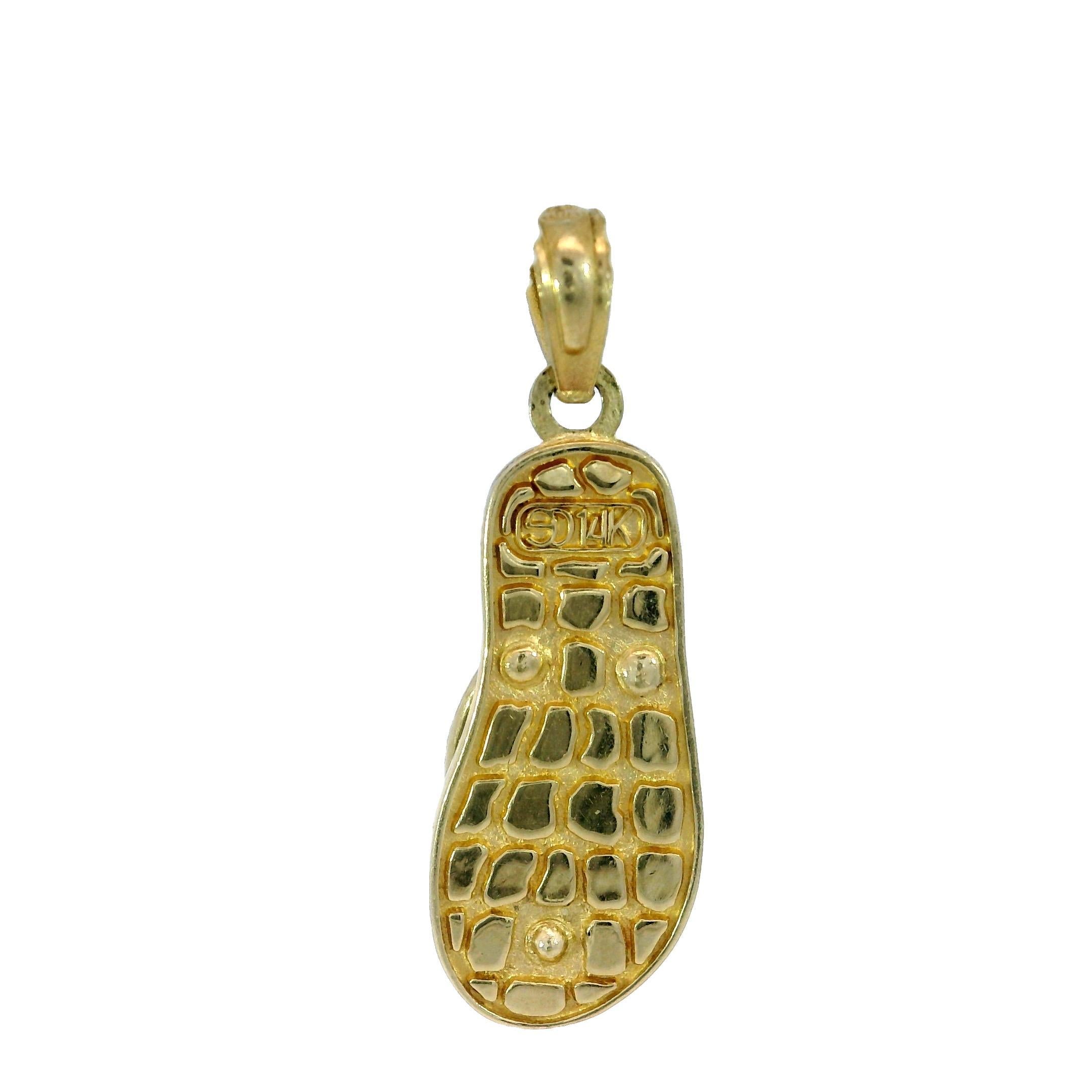 Colgante Chanclas Esmaltadas Oro Amarillo 14K

Capturando el espíritu despreocupado de un día en la playa, este caprichoso colgante está fabricado en oro amarillo de 14 quilates y diseñado en forma de chancla. Los lunares azules esmaltados bailan