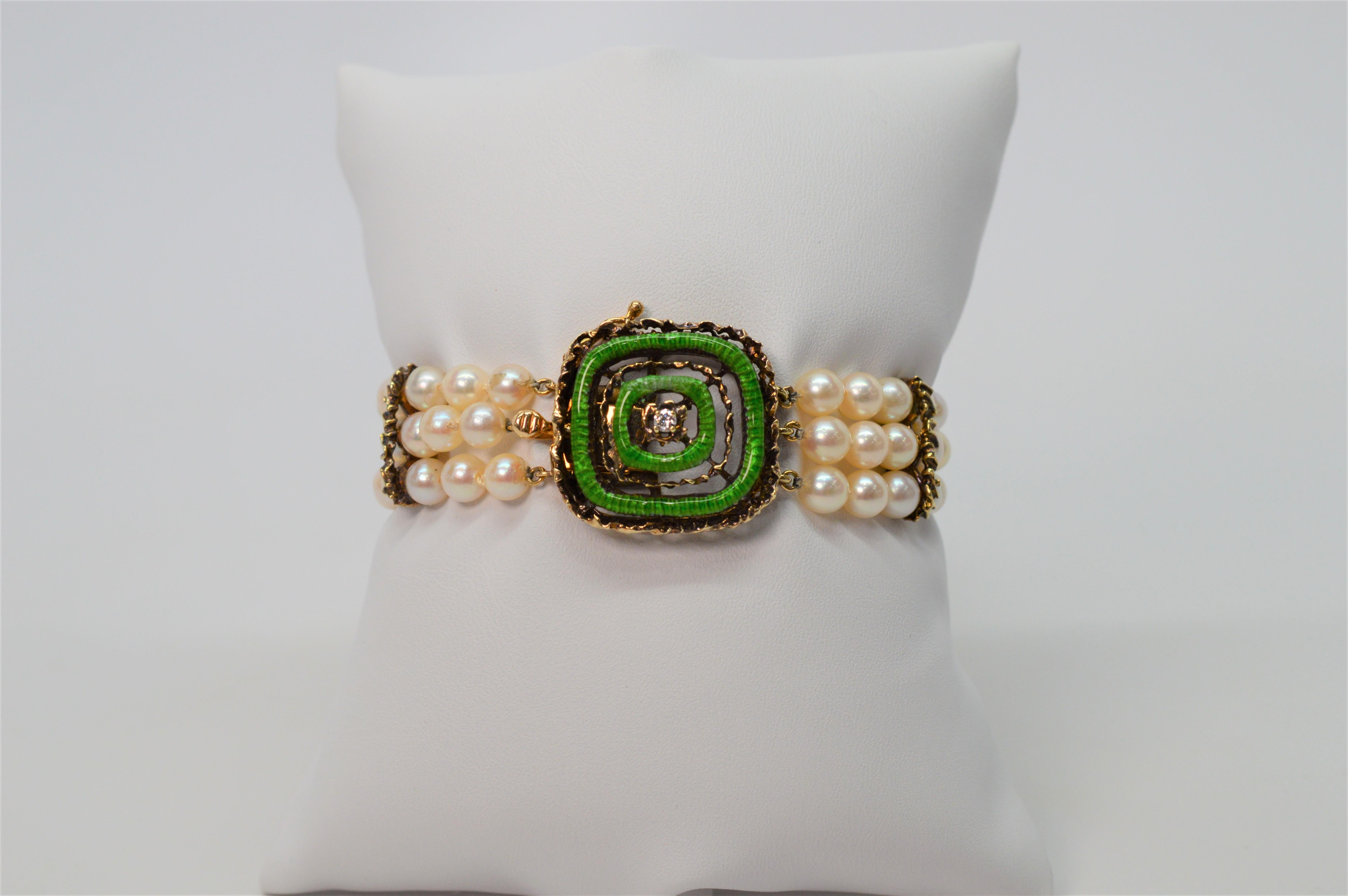 Whimsical in nature, this triple strand bracelet  is an eclectic mix of classic AAA Akoya Pearls with rustic 14 Karat Yellow Gold accents featuring an unusual fine Green Enamel 14 Karat Charm with a Diamond center that doubles as the clasp.  Seven