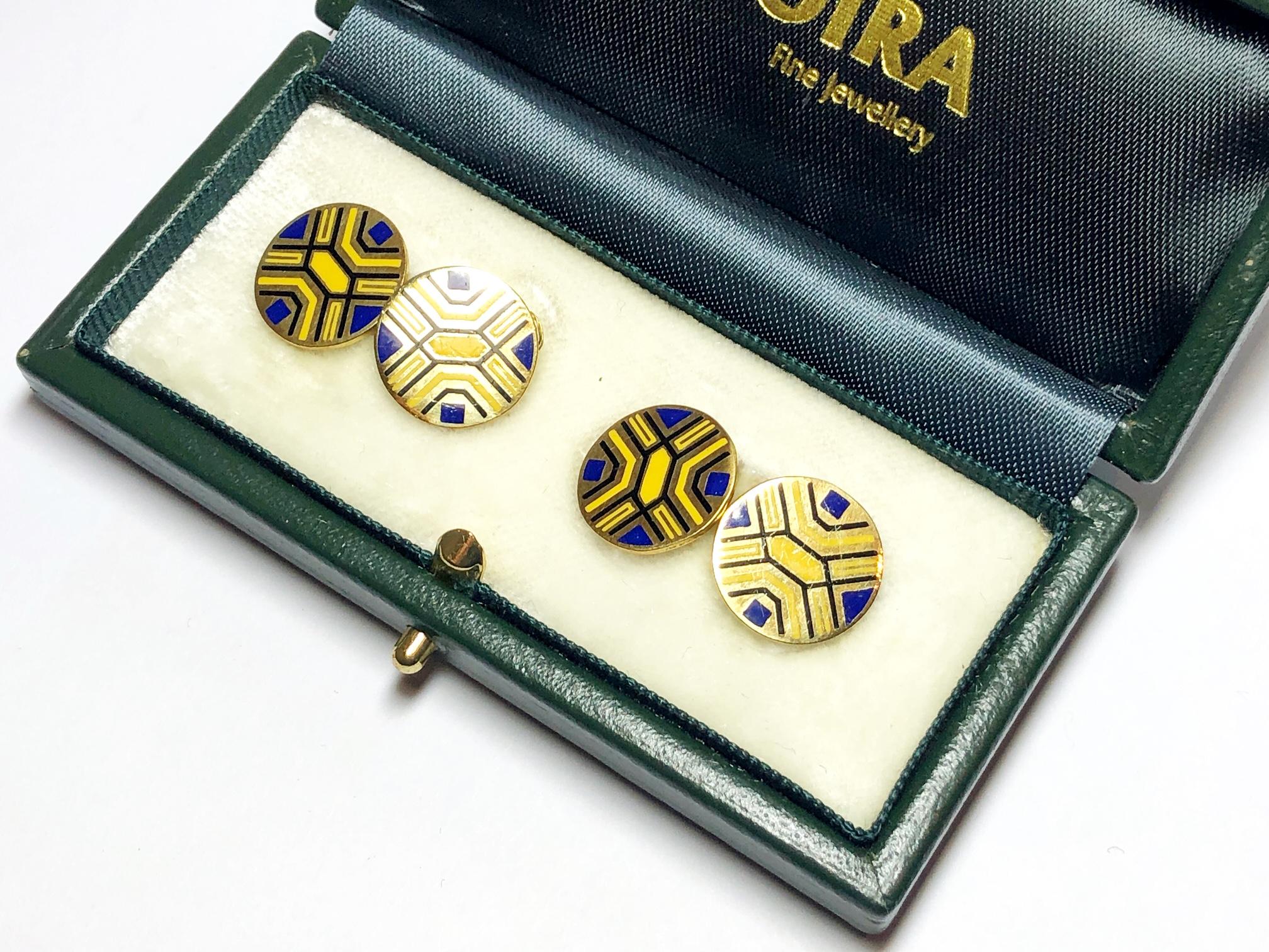 A pair of vintage enamel and gold cufflinks, circular in shape, with yellow and blue enamel in an abstract design, on 14ct yellow gold, with bar fittings, circa 1950.
