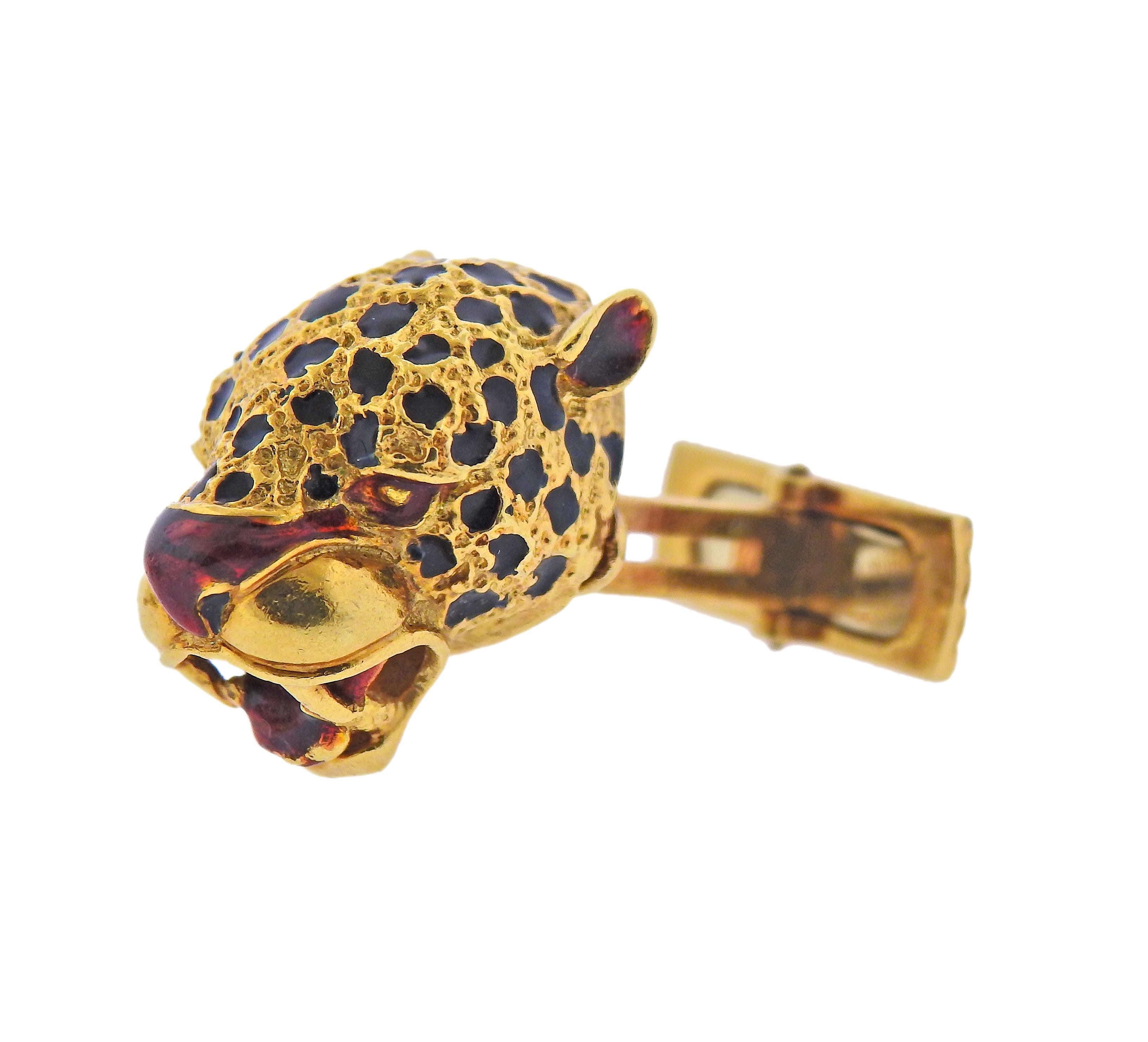 Paire de boutons de manchette en or jaune 18 carats en forme de jaguar, décorés d'émail. La partie supérieure du bouton de manchette mesure 20 mm x 16 mm. Poids - 20 grammes. 