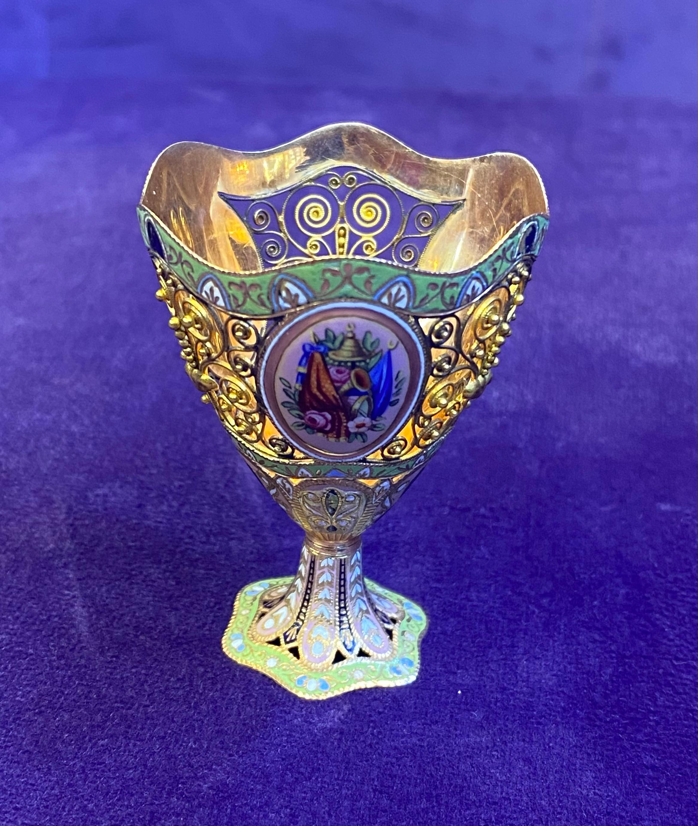 Multi Color Enamel & Gold Zarf -A zarf is a small cup used for coffee designed to hold a small container inside in which to put the coffee.  This zarf  is designed with multi color enamel floral motifs on each side of the cup along with a gold