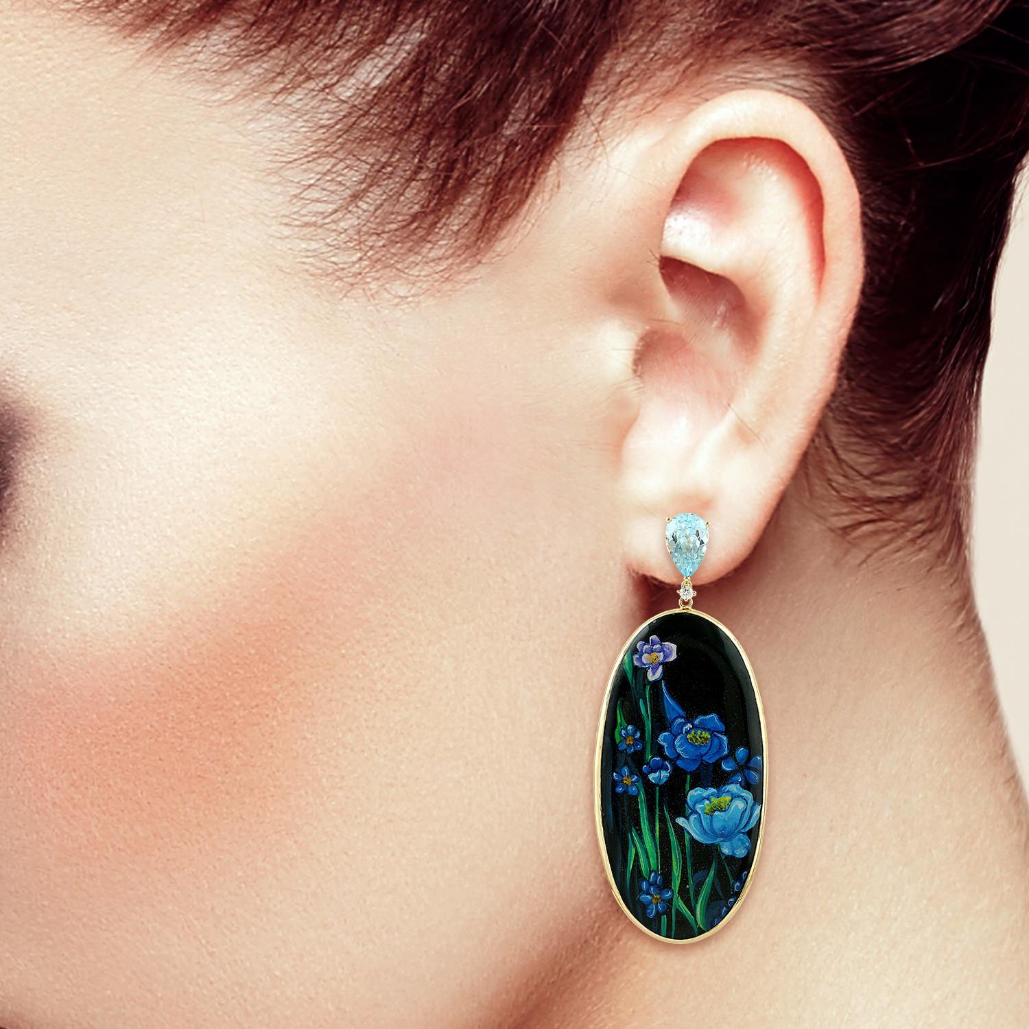 These beautiful earrings features unique hand painted miniature art set with 18K gold, 61.85 carats bakelite, 7.2 carats blue topaz & 0.12 carats diamonds.

FOLLOW  MEGHNA JEWELS storefront to view the latest collection & exclusive pieces.  Meghna