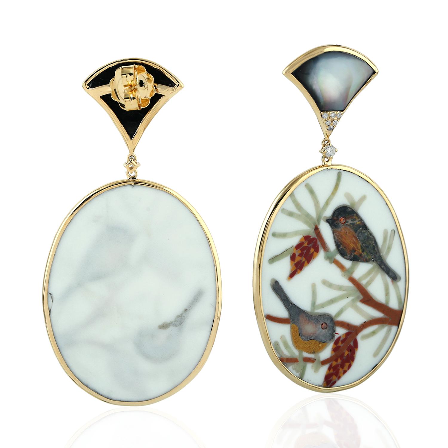 These beautiful earrings features unique hand painted miniature art set. Cast in 18-karat gold.  It is set with 8.85 carats Mother of pearl and .29 carats of sparkling diamonds. 

FOLLOW  MEGHNA JEWELS storefront to view the latest collection &