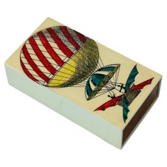Fornasetti Caja de metal esmaltado de caoba