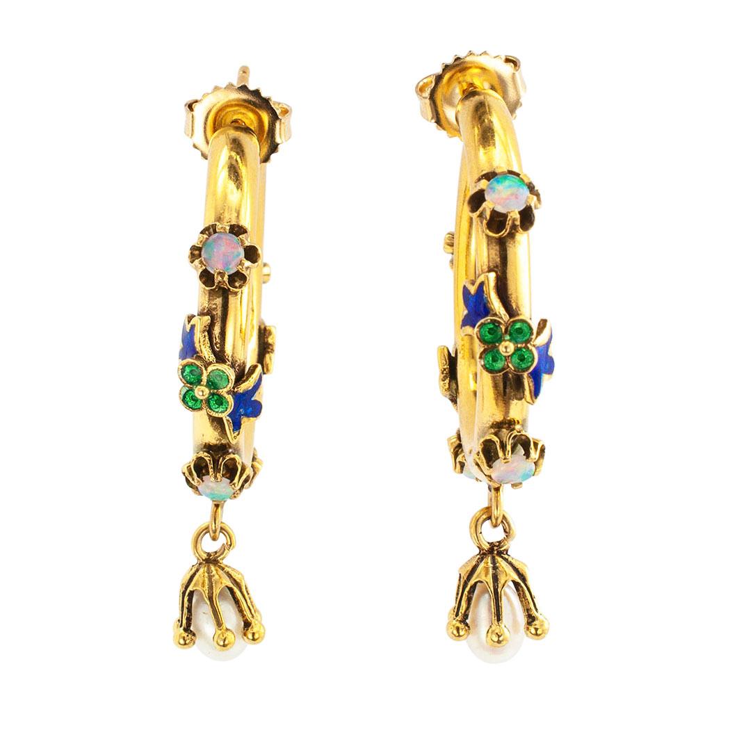 Enamel opal pearl and gold hoop earrings circa 1980. The matching circular designs comprise tubular gold rings decorated front and back by four round opals alternating with applied enamel flower motifs, balanced by a teardrop-shaped pearl charm,