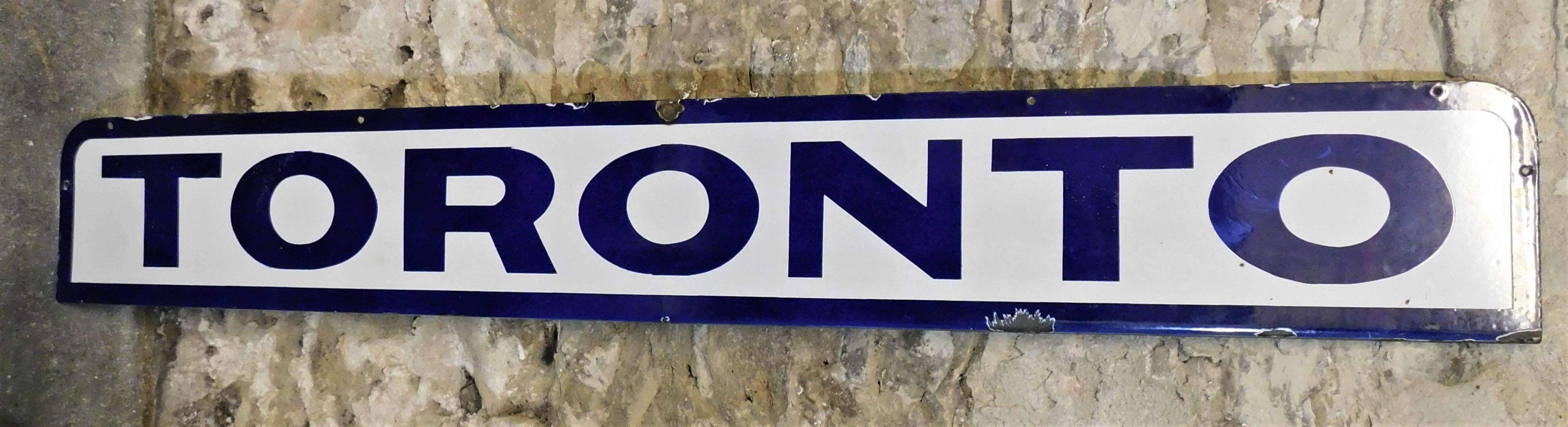 Large five foot long Toronto one sided porcelain or enamel sign. Even though this sign is the blue and white of the Toronto Maple Leafs in Ontario Canada, it is said to have come from a train station in Toronto Ohio, USA. Has a one inch lip at the