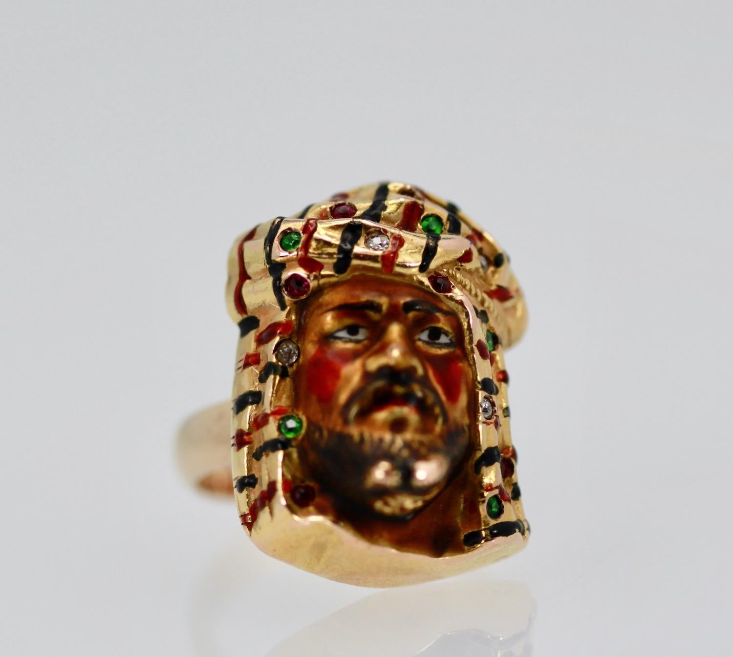 This portrait ring of a man's face is extremely detailed and the enamel is in near perfect condition.  The face has a bread, mustache and headwrap in gorgeous vivid enamel and the condition of the enamel is excellent.  This ring can be sized as it