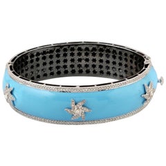 Bracelet jonc émaillé en émail, turquoises et diamants en forme d'étoile