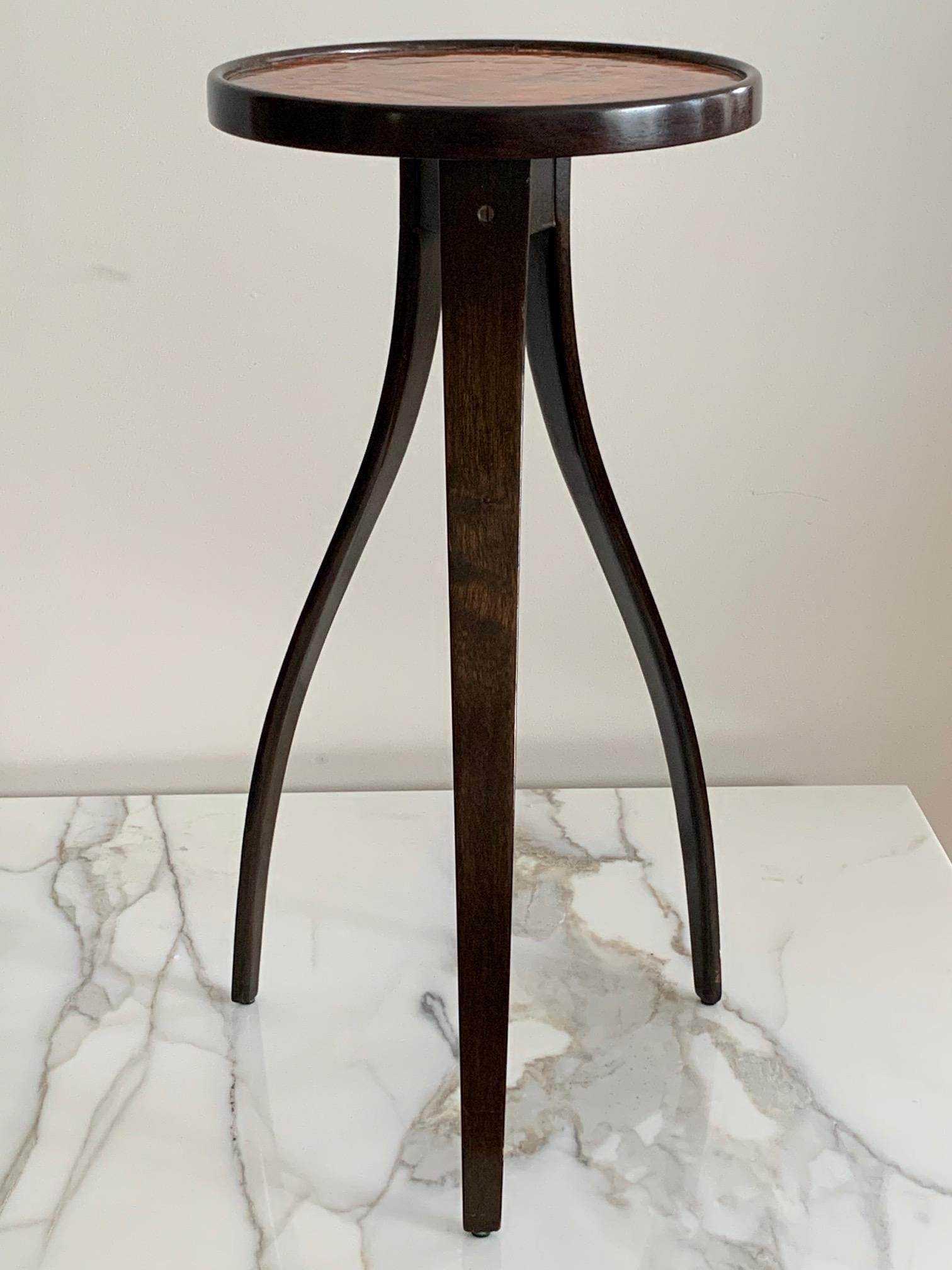 A rare and unusual Harvey Probber side table/gueridon with elegant bentwood legs and enamel top.