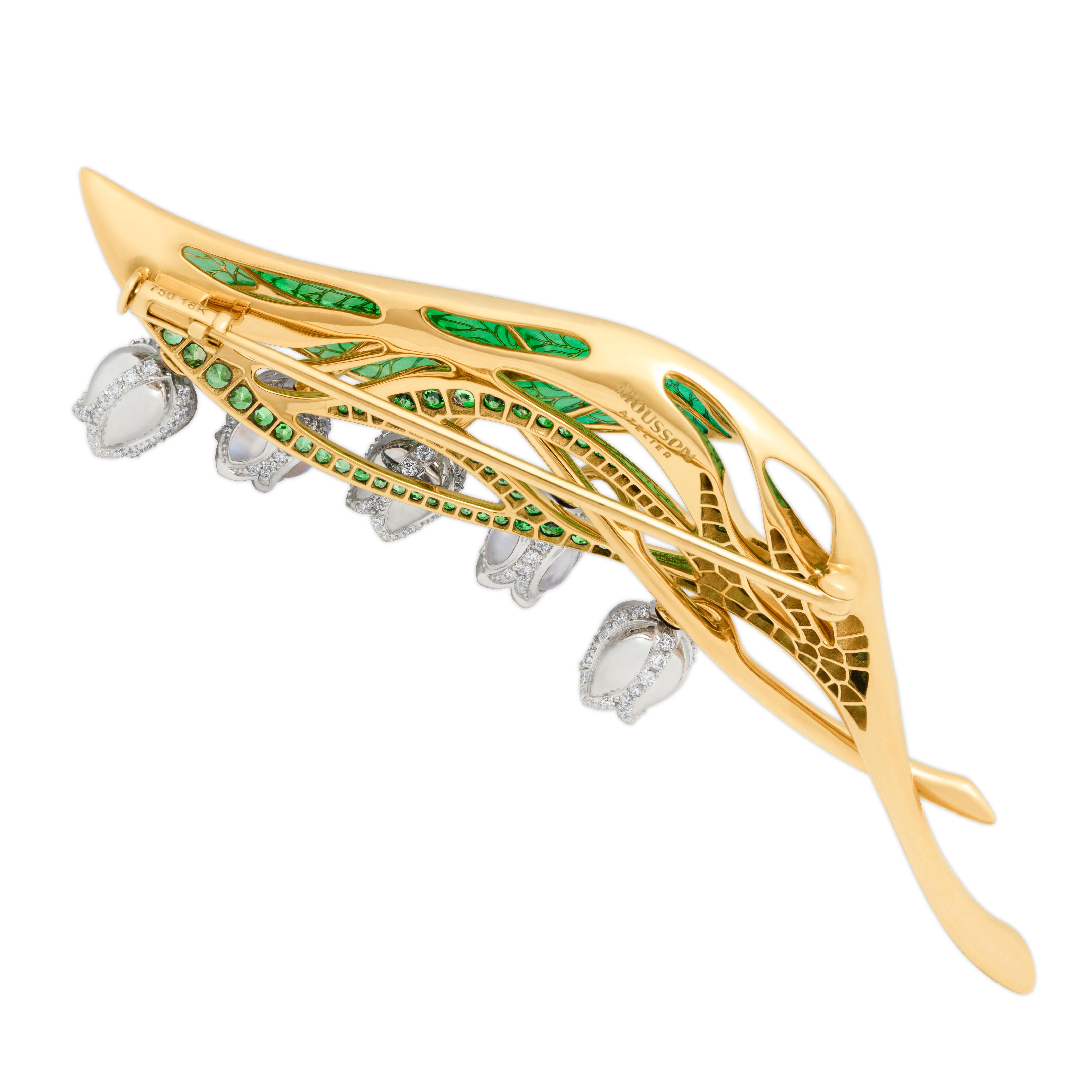 Enamel Tsavorite Diamond 18 Karat Yellow Gold Lilly of Valley Brooch
Transparent Enamel supported by green Tsavorites. Dangling flowers with rainbow moonstones or diamonds. High detailing.

77mm x 26mm x 15mm
25.37 gms