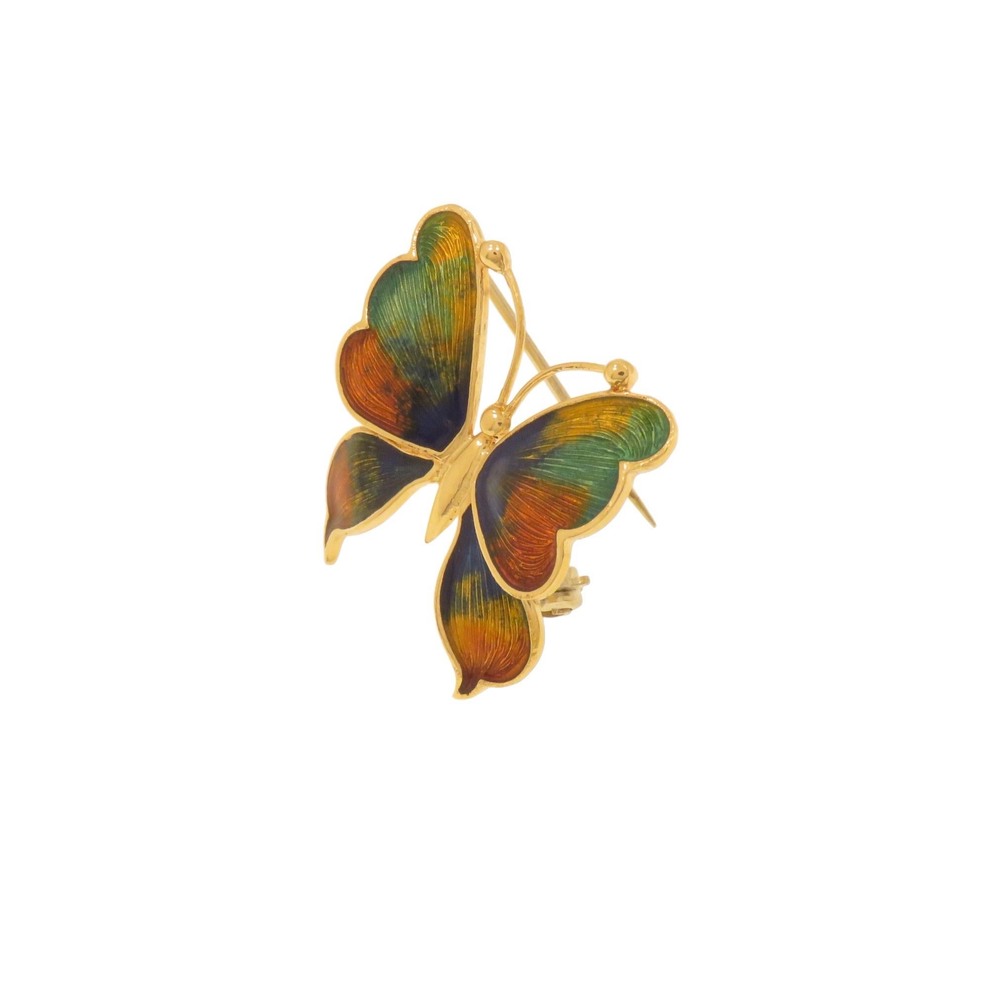 Jolie broche vintage papillon en émail or jaune 18 carats dans les tons bleu, orange, vert et jaune. La taille est de 27X28mm / 1.062x1.102 pouces. L'émail est parfait et l'épingle est droite. Elle se ferme avec un fermoir de sécurité. Marqué de la