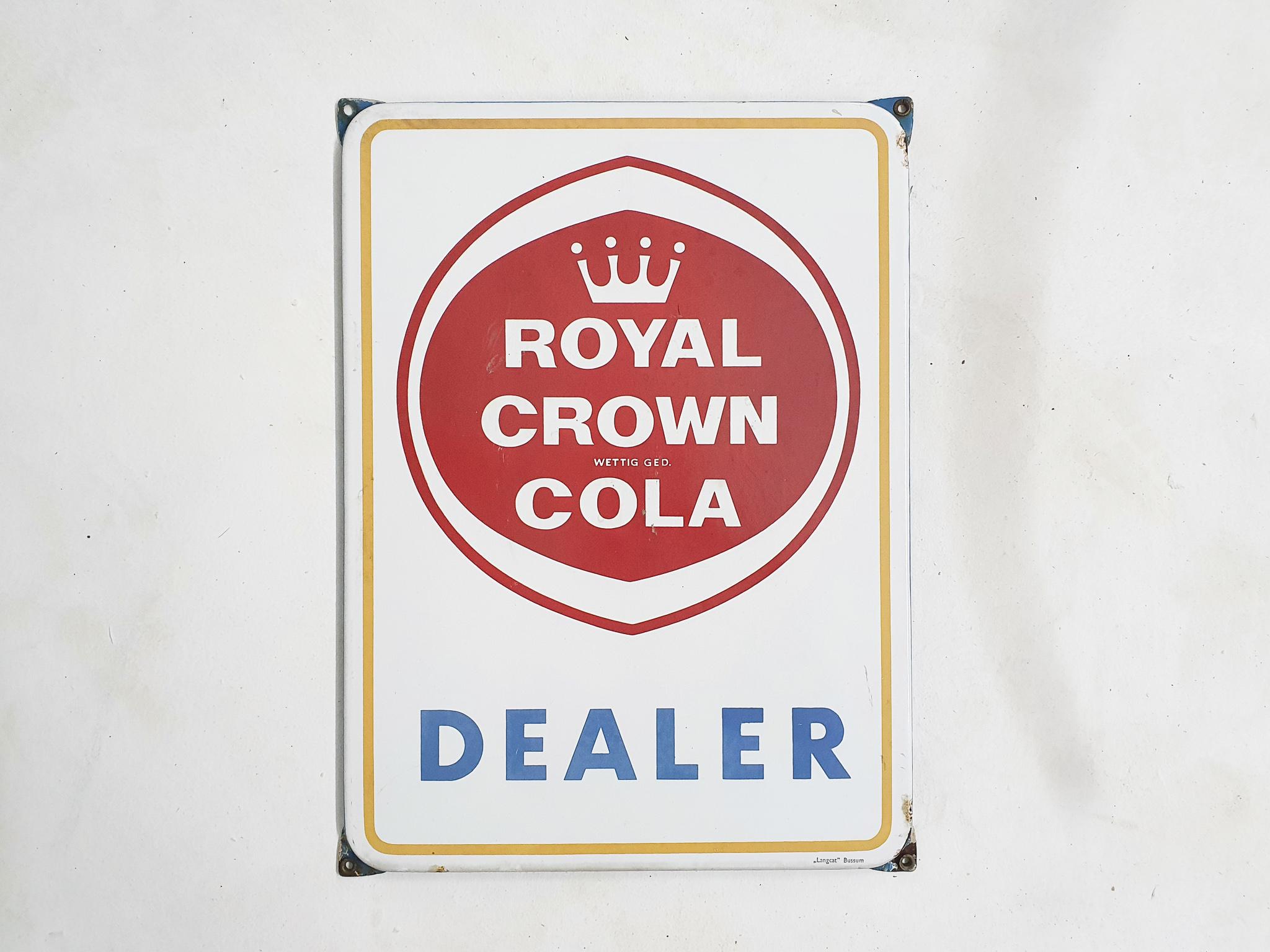 Enamelled advertisement sign for Royal Crown Cola. Made by Langcat Bussum the Netherlands in the 1950's.

Langcat Bussum was probably the most famous manufacturer of enamelled signs in mid-century. The Dutch based company designed and made many