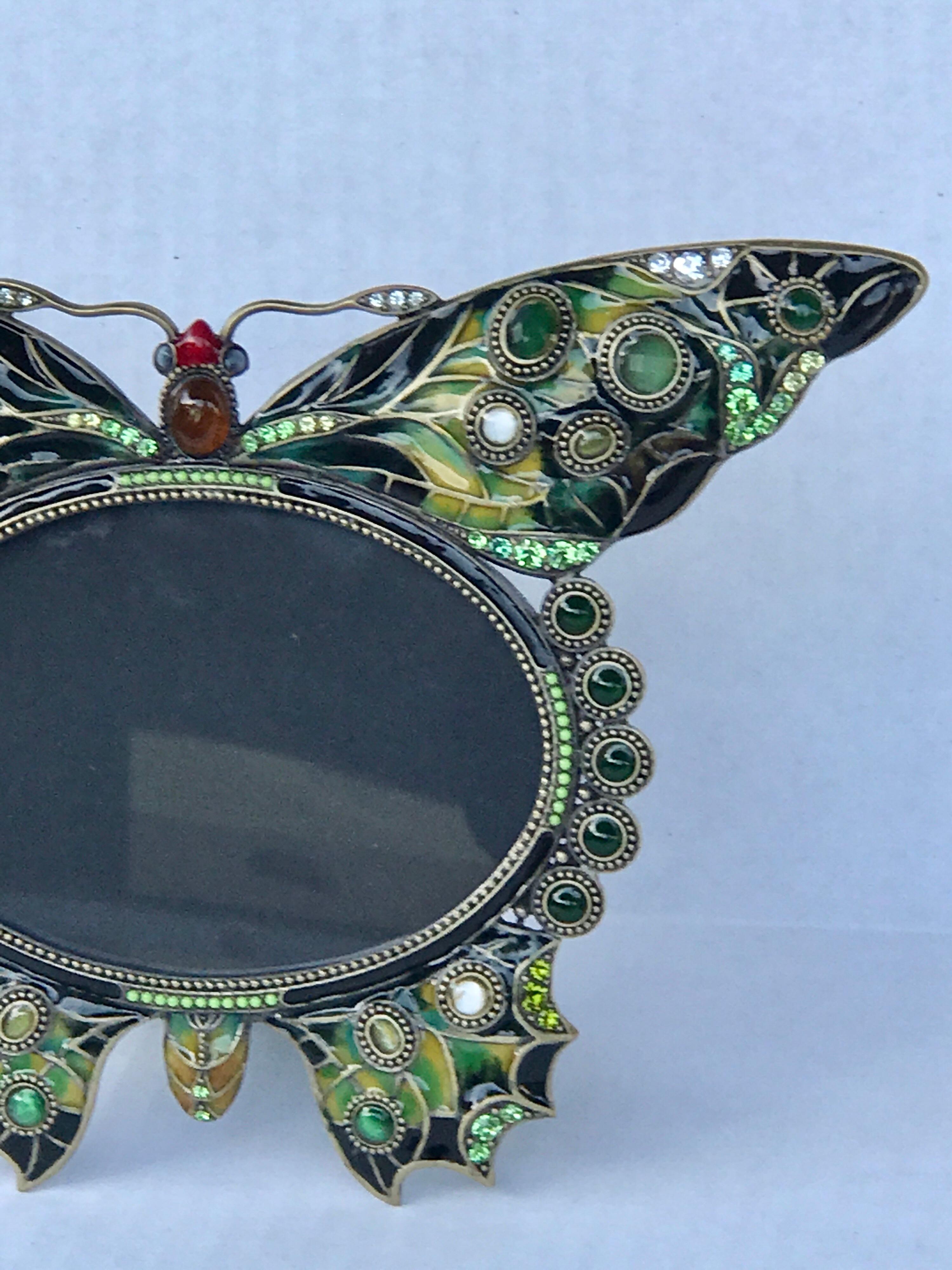 Enameled and jeweled butterfly frame, in the manner of Jay Strongwater, holds a 3