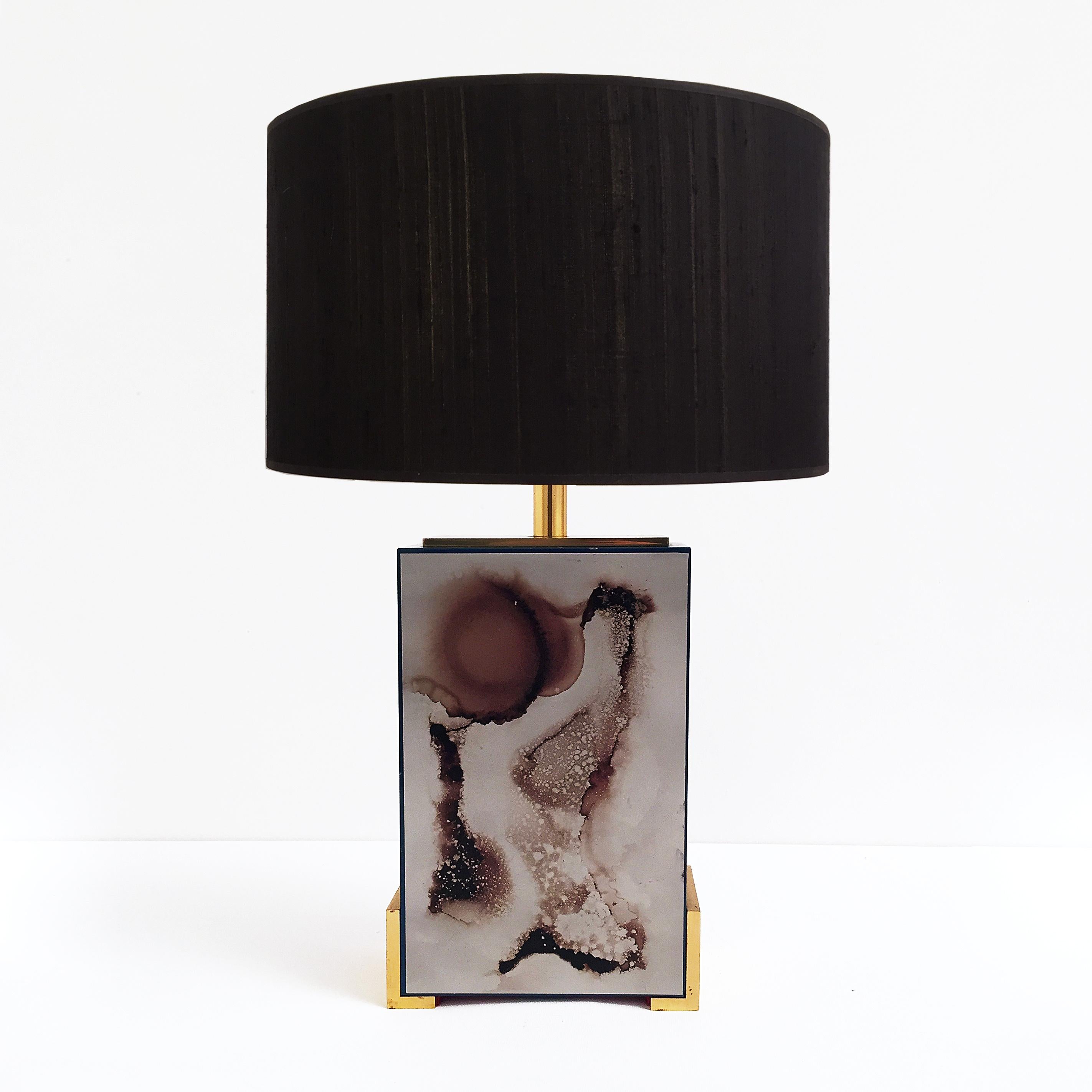 Unique table lamp in blue enamel with burned chrome design and brass elegant accents. Signed J.G. on bottom left. An elegant and modern design (shade is only for display purposes).
 